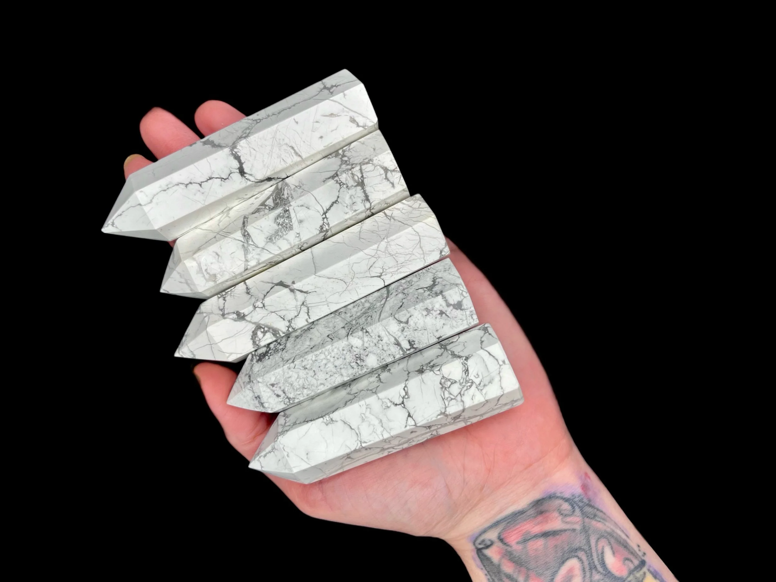 White Howlite tower with natural matrix veining polished point Natural white Howlite crystal point with intricate gray webbing
