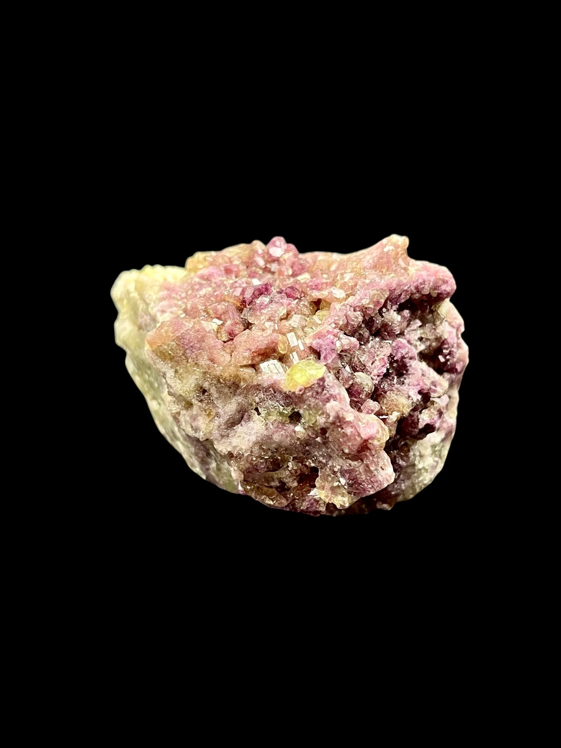 Sparkling pink Vesuvianite crystal cluster on matrix Canada