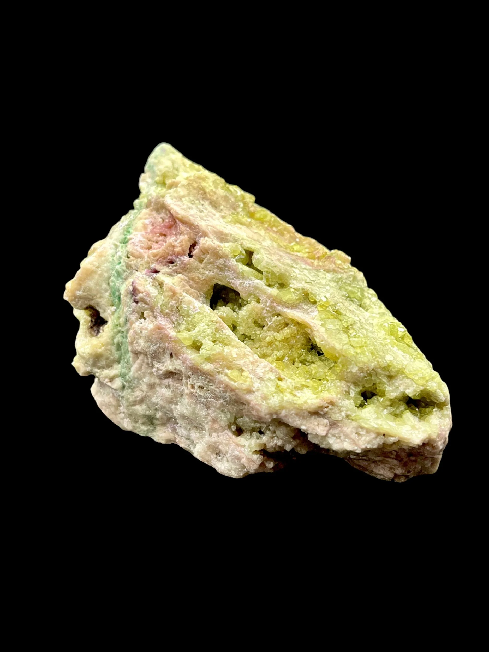 Large collector-grade pink green Vesuvianite crystal from Quebec Canada