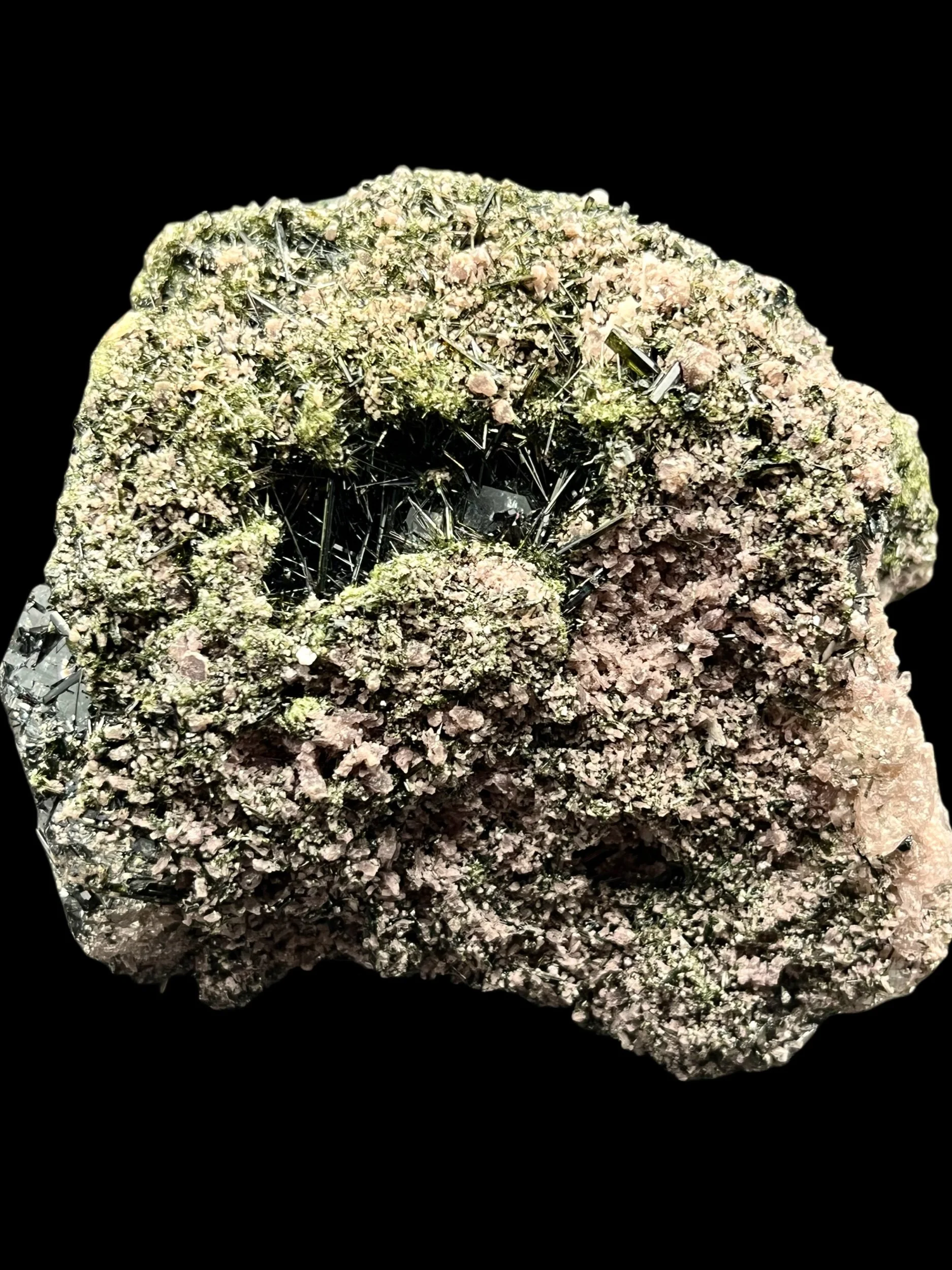 Black and green tourmaline crystal sprays in pink lepidolite matrix from Brazil