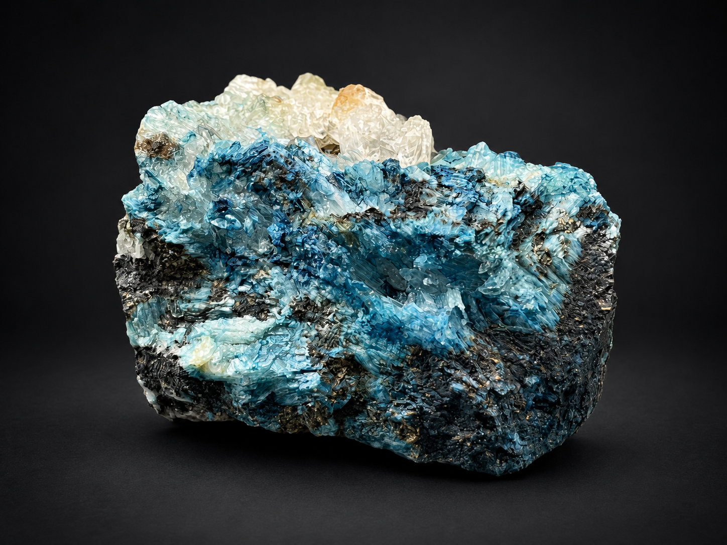 Blue Selenite on Shattuckite from Ojuela Mine, Mexico, showing vivid turquoise-blue mineralization, champagne-white crystal clusters, and dark matrix,