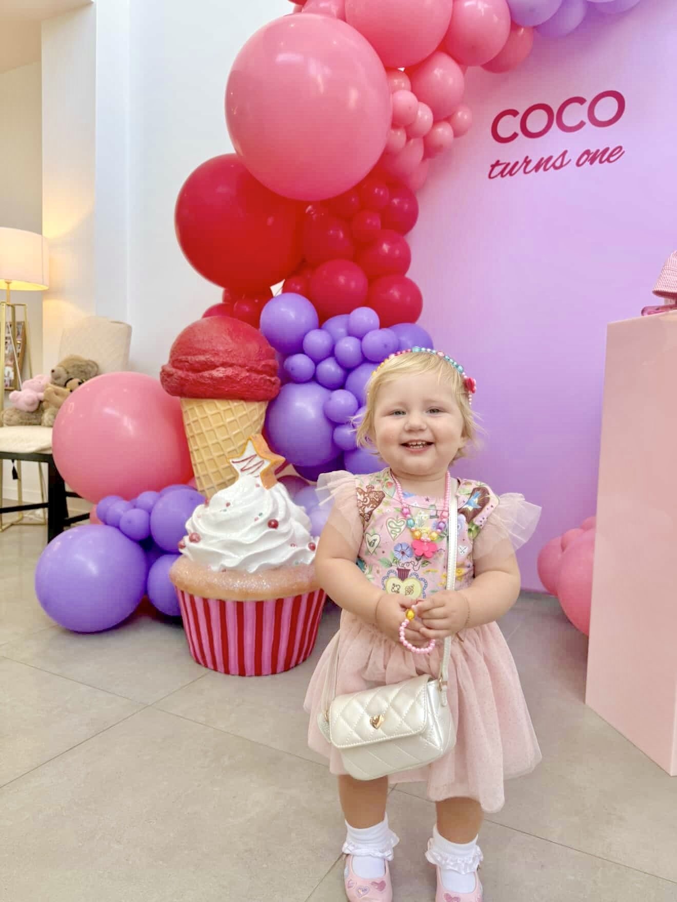 Coco's 1st Birthday with our cupcake and ice cream prop.jpg