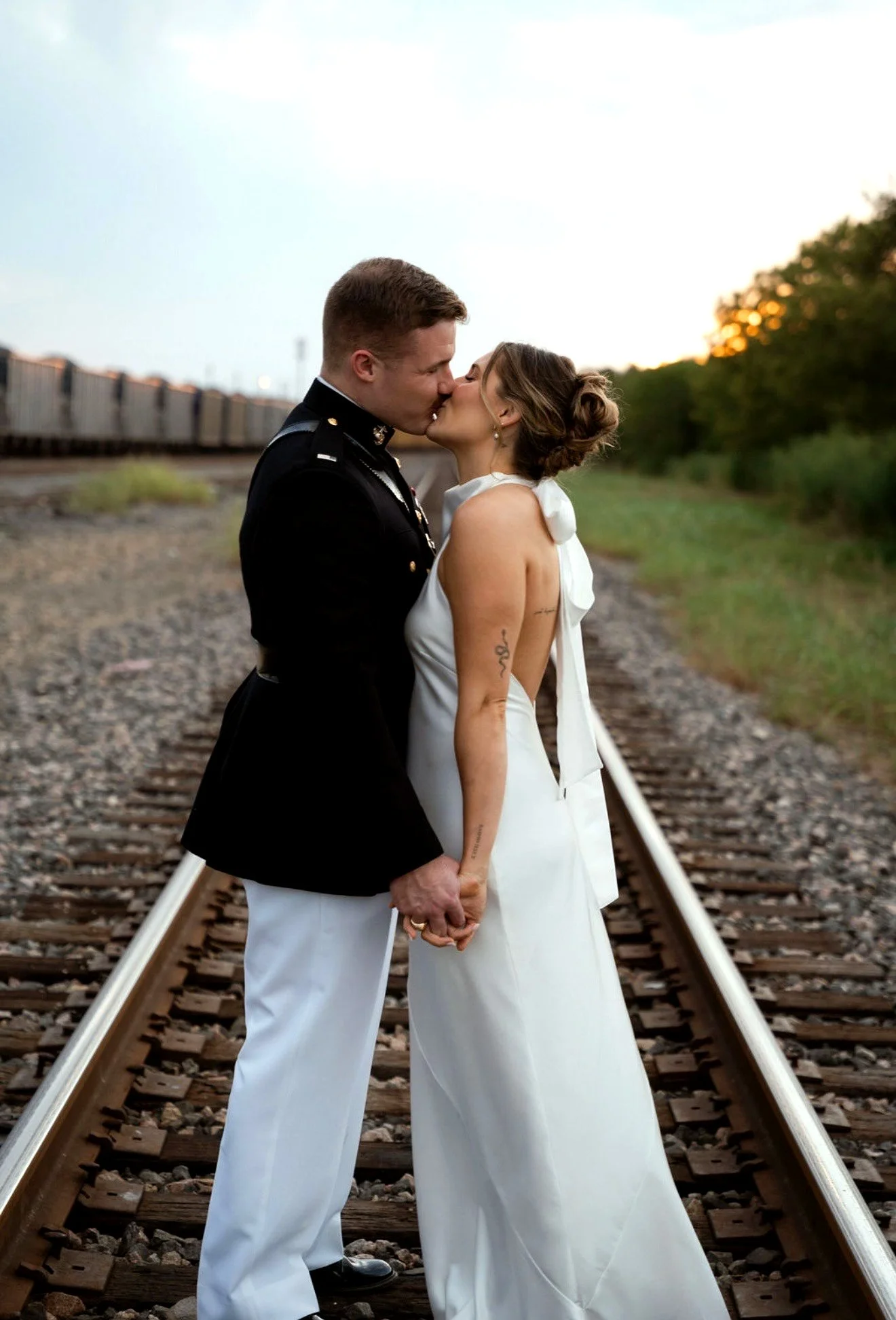 Ingrid and Cole Rr tracks kissing.jpg