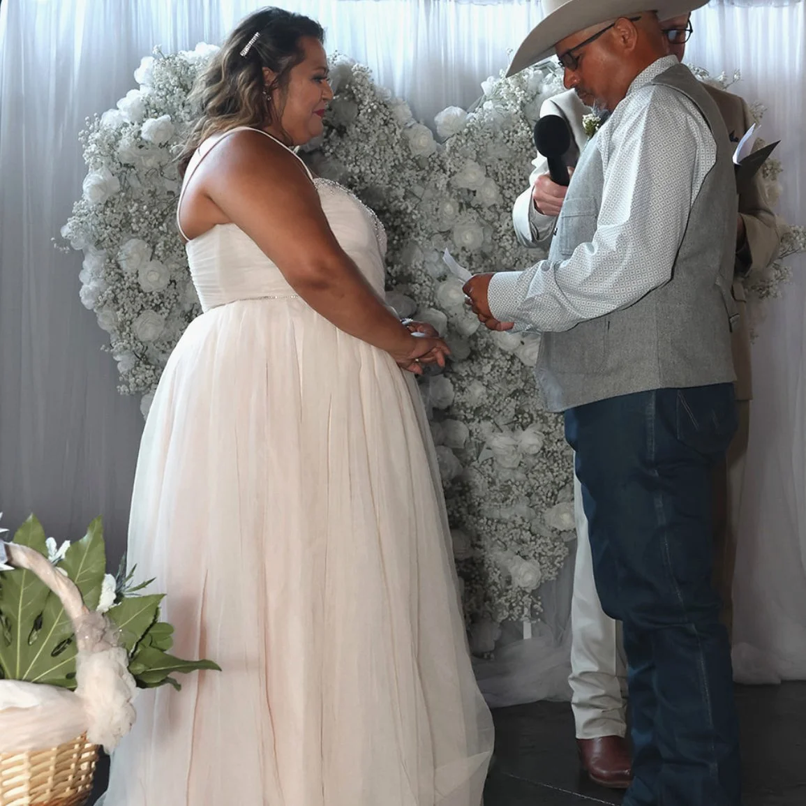 Sandy and Carlos at the alter.jpg