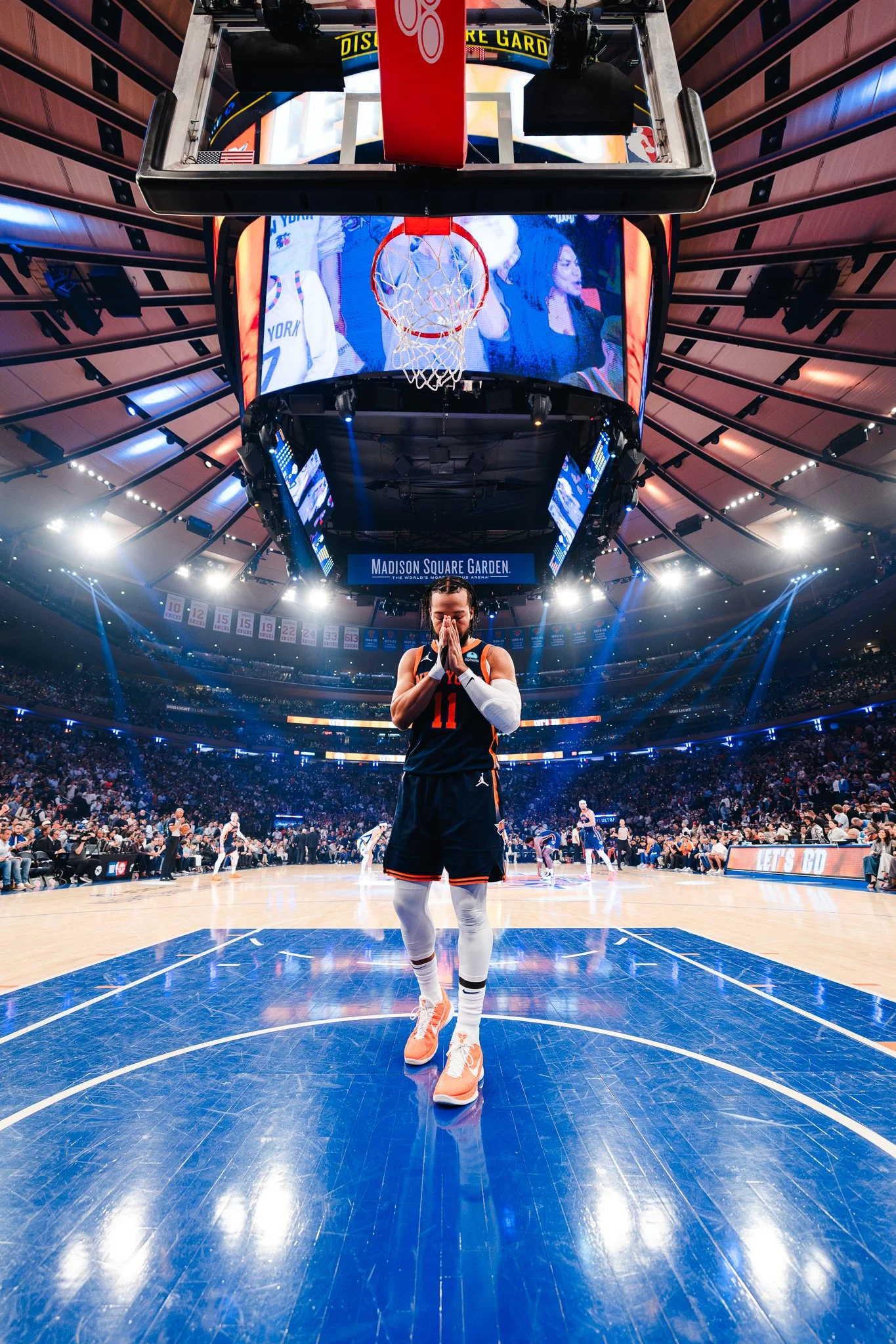 Jalen Brunson of New York Knicks prays before game.