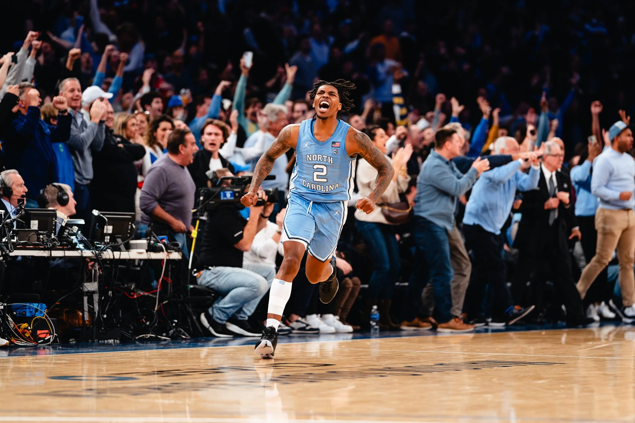 Caleb Love of UNC celebrates.