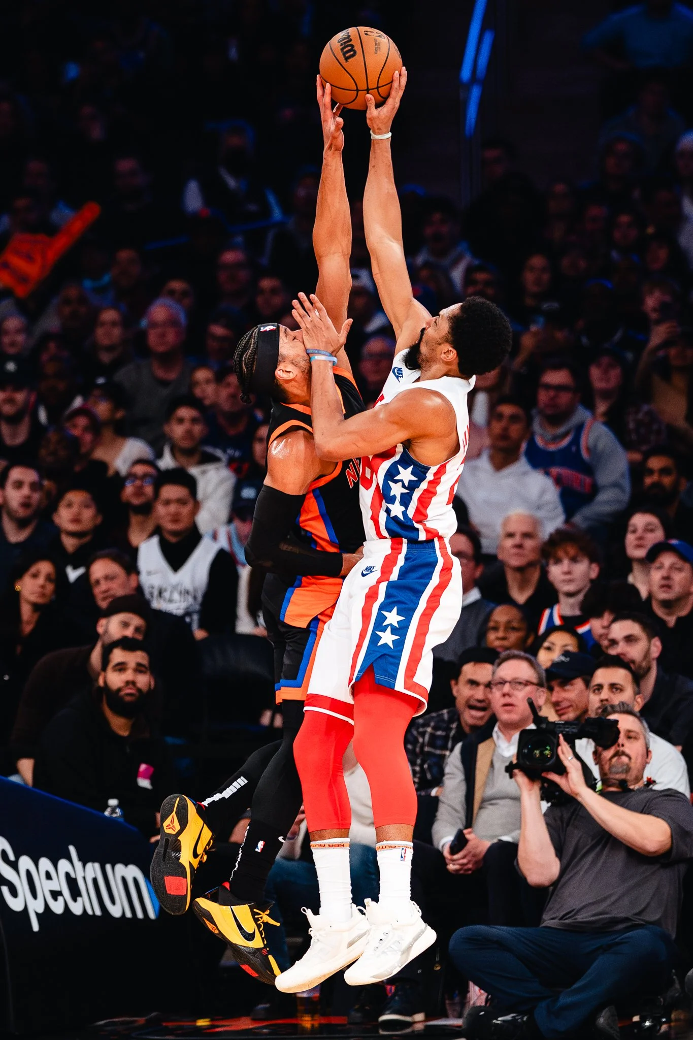 Josh Hart of New York Knicks blocks shot.