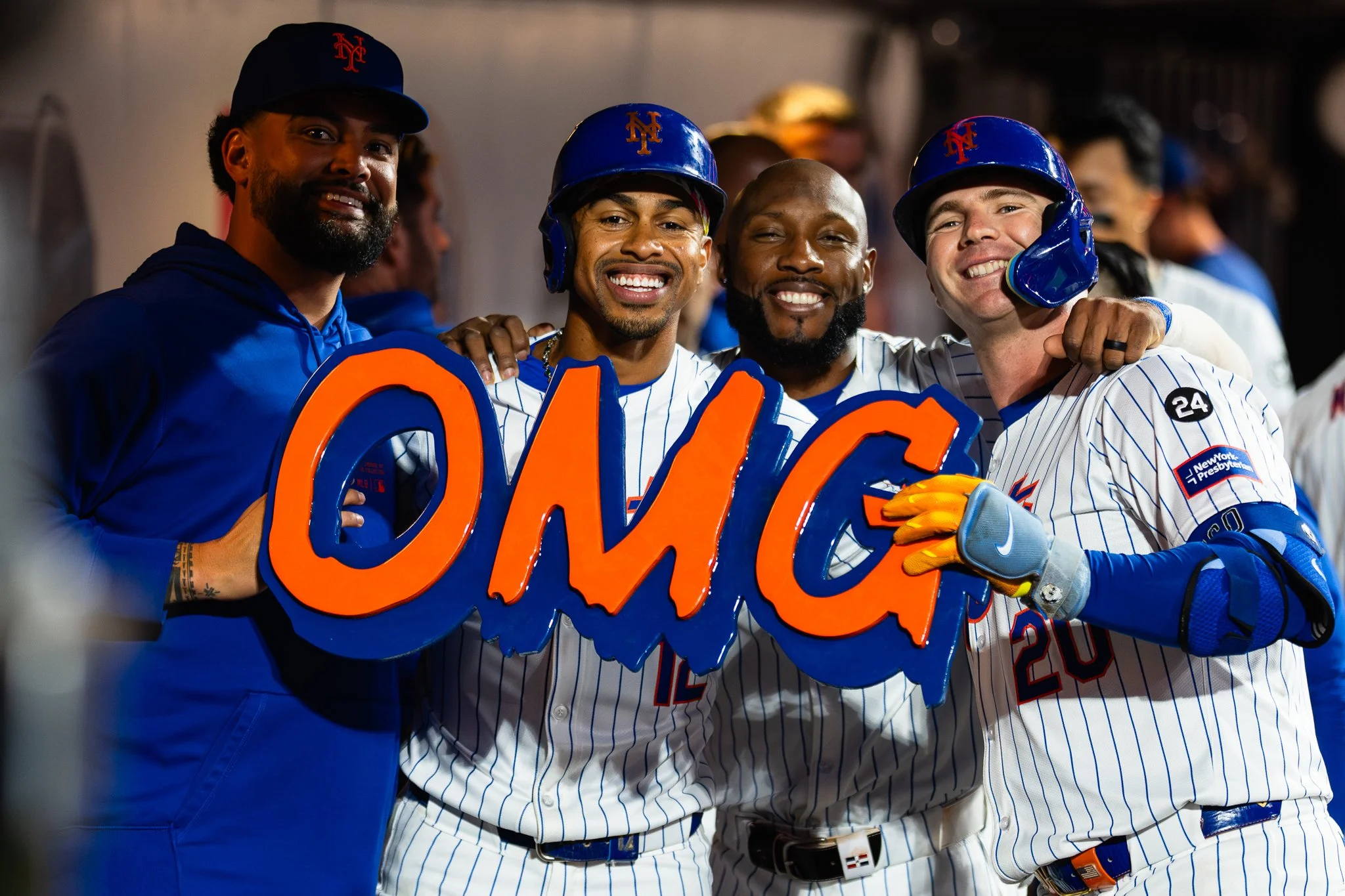 Sean Manaea, Francisco Lindor, Starling Marte, and Pete Alonso of New York Mets celebrate with OMG sign.
