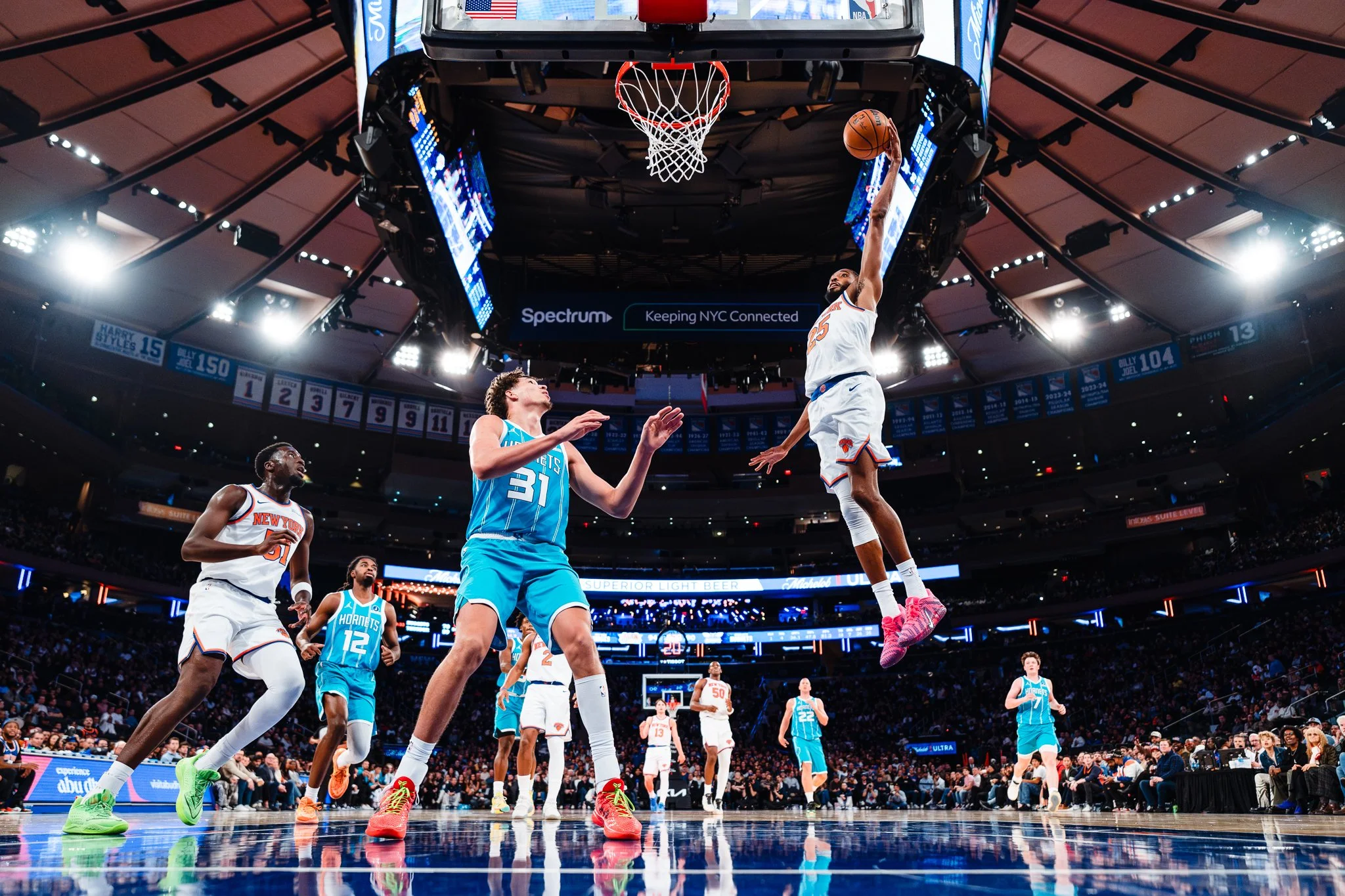 Mikal Bridges of New York Knicks dunks ball.