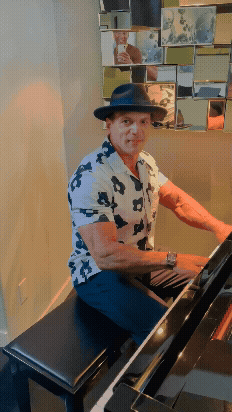 Charles playing piano (1).gif