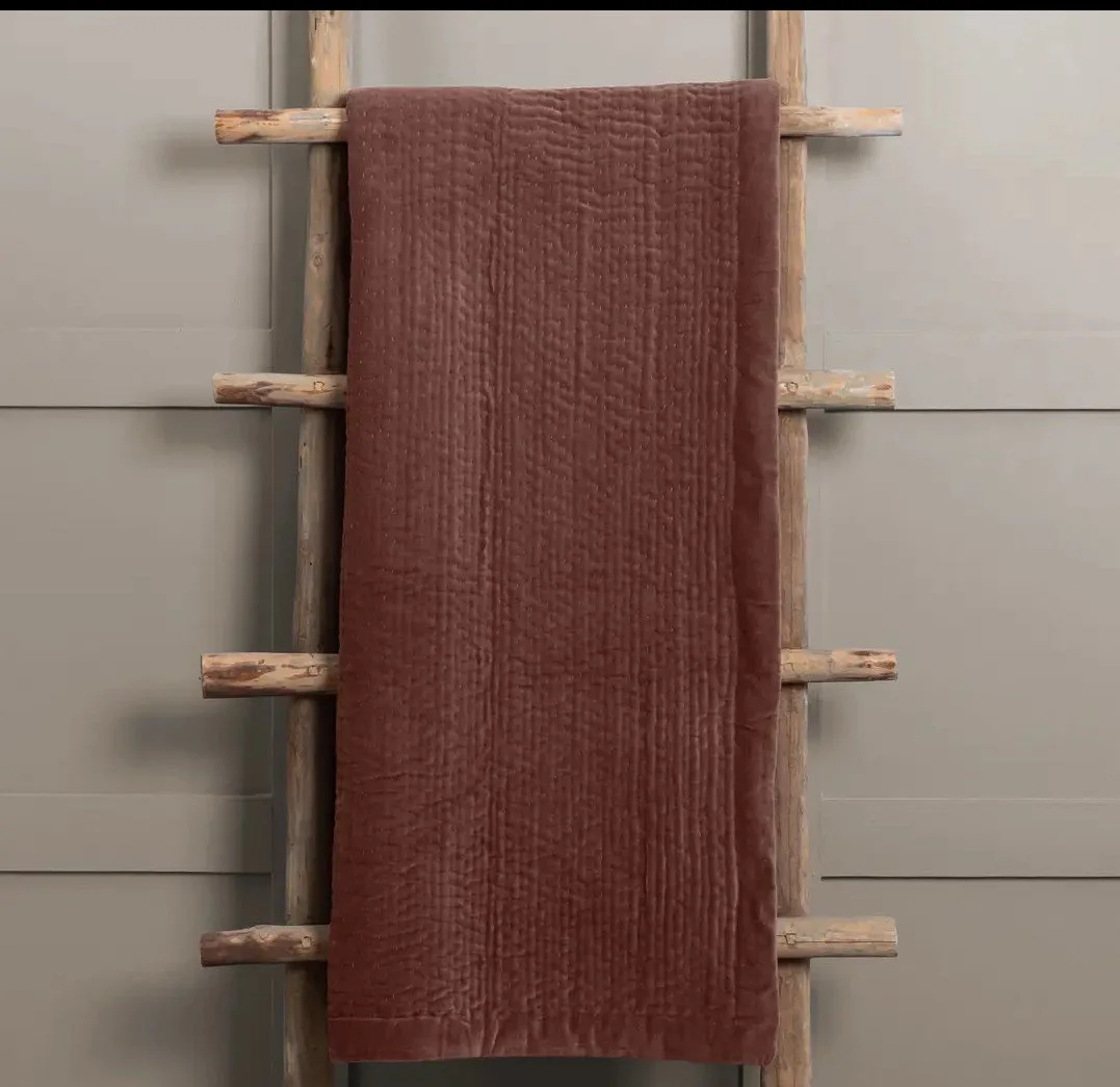 Large hand stitched quilted velvet throw in soft terracotta pink.
