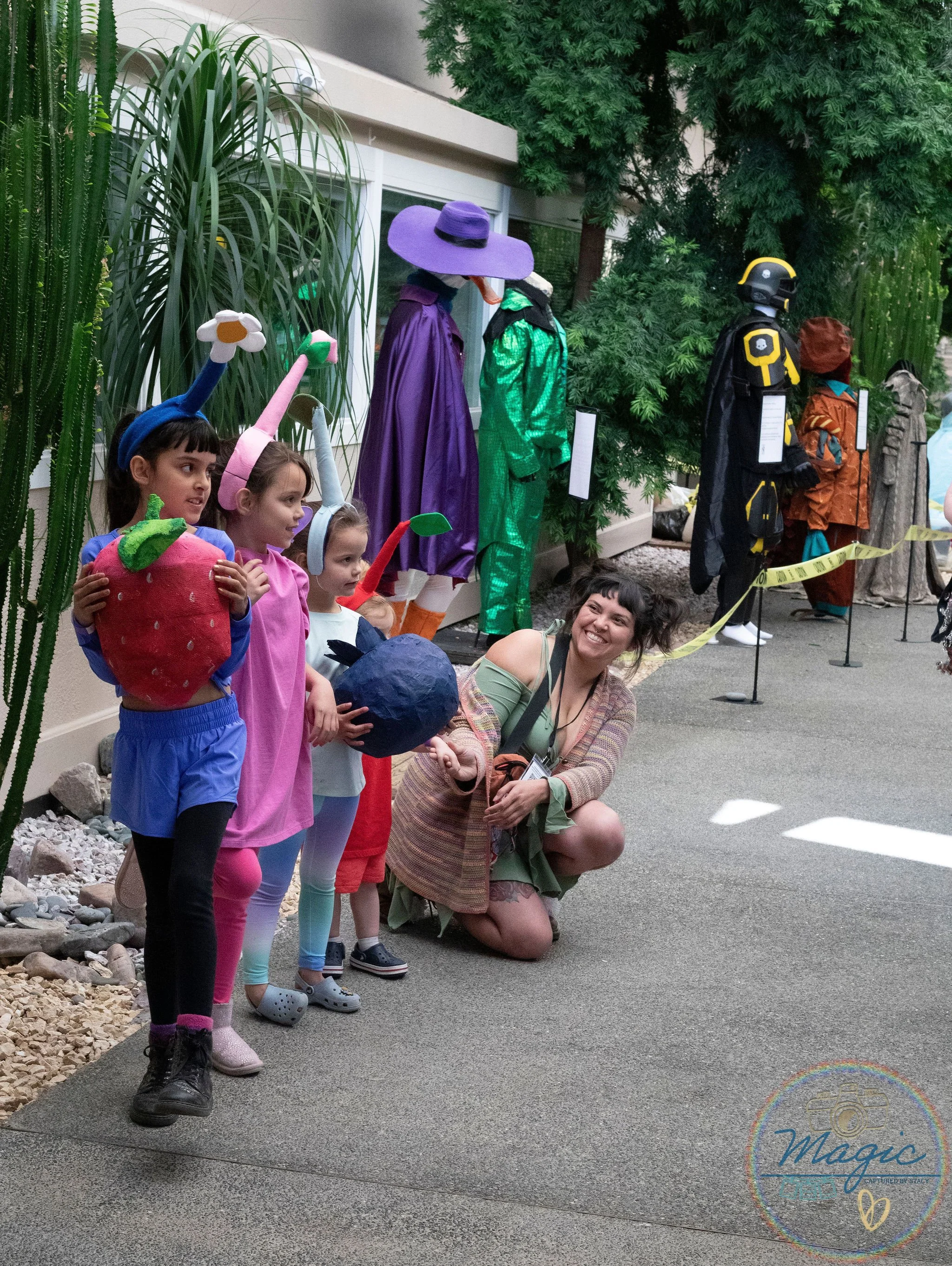 Children in costumes posing for a picture