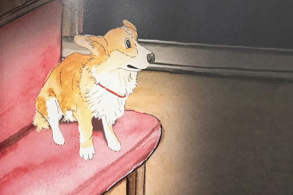 Watercolor of Rally the corgi sitting on a red train seat inside the dark tunnel