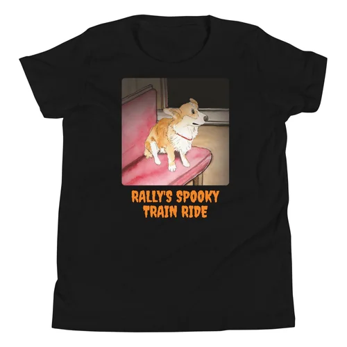 Rally's Spooky Train Ride Halloween kids tee in black, printed with Rally the corgi on a red train seat in the dark tunnel