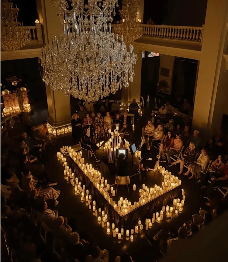 A candlelit concert under crystal chandeliers in the Katy Depot ballroom
