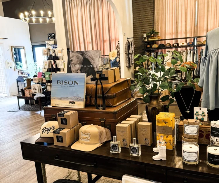 Books, hats, candles and western gifts on display at Ray's Mercantile in the Katy Depot