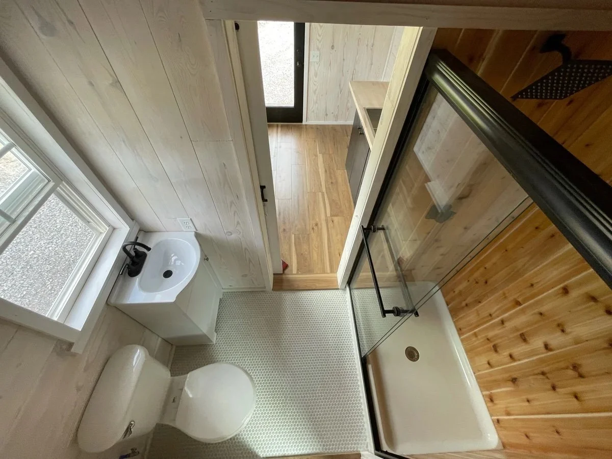 Bathroom of Willow Model Tiny Home with Penny Tile and Cedar Shower