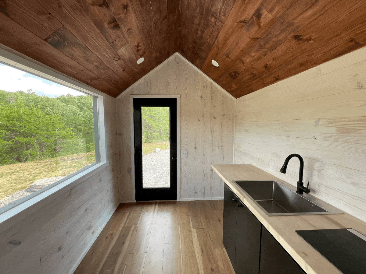 Kitchenette and Picture window view of the Willow Model Tiny Home