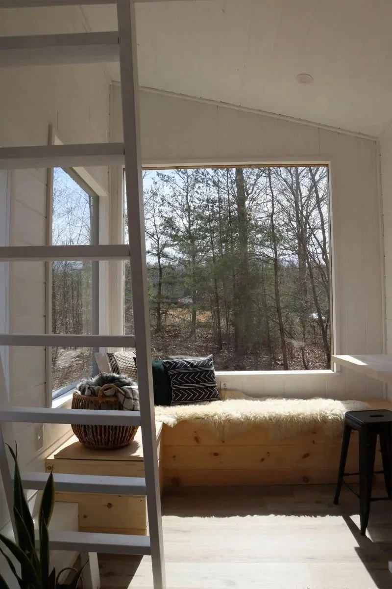 Large Picture Windows above a bench area