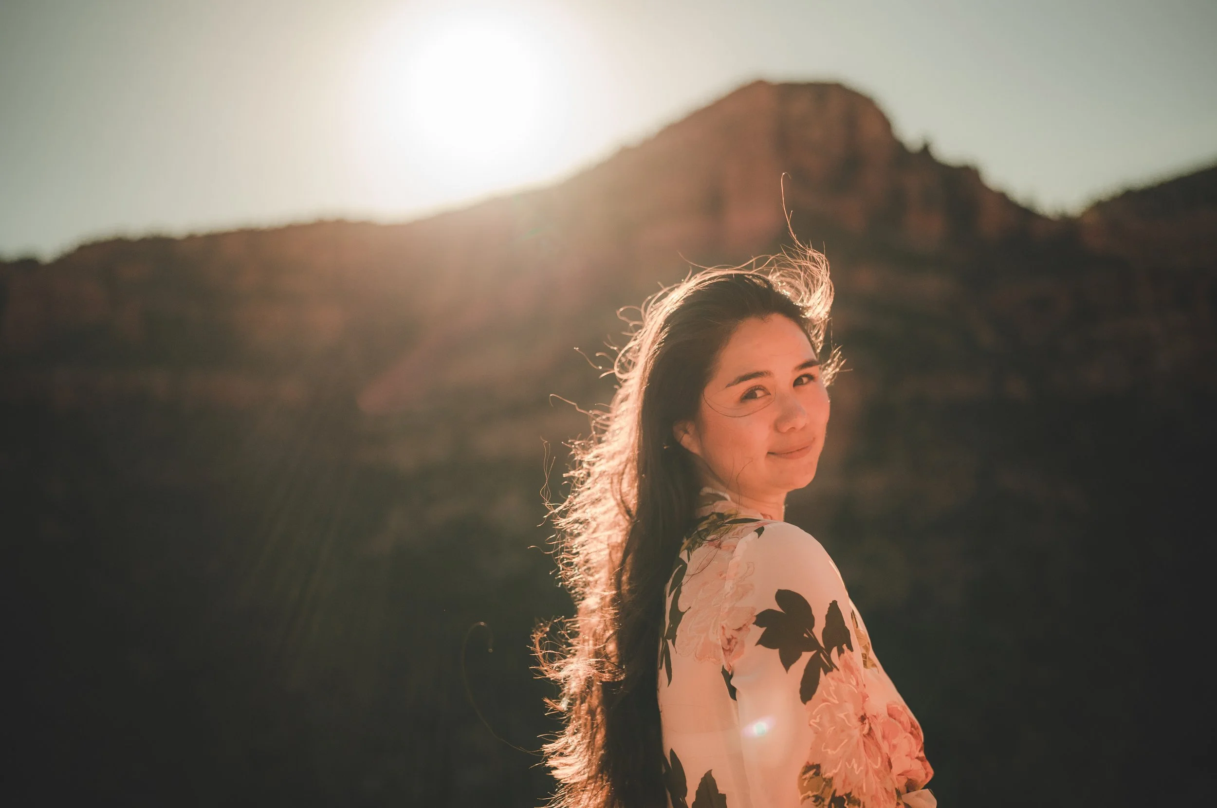 Chi Yun Takaki looking over shoulder smiling, the Chi Tree, Sedona Arizona