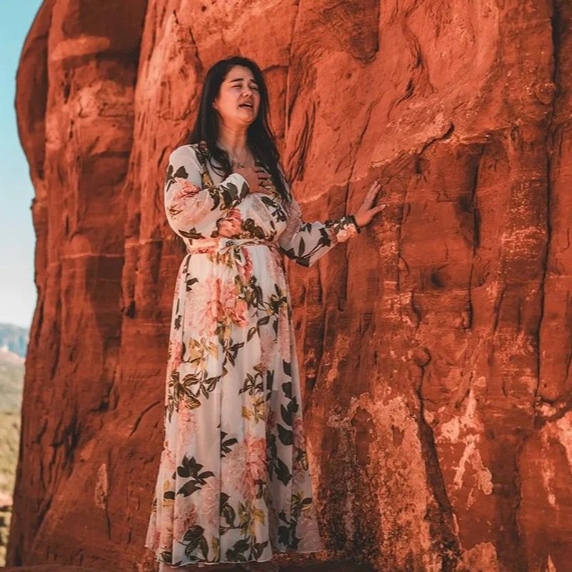 Chi Yun singing sonic transmissions into Sedona, Arizona canyons for the Chi Tree