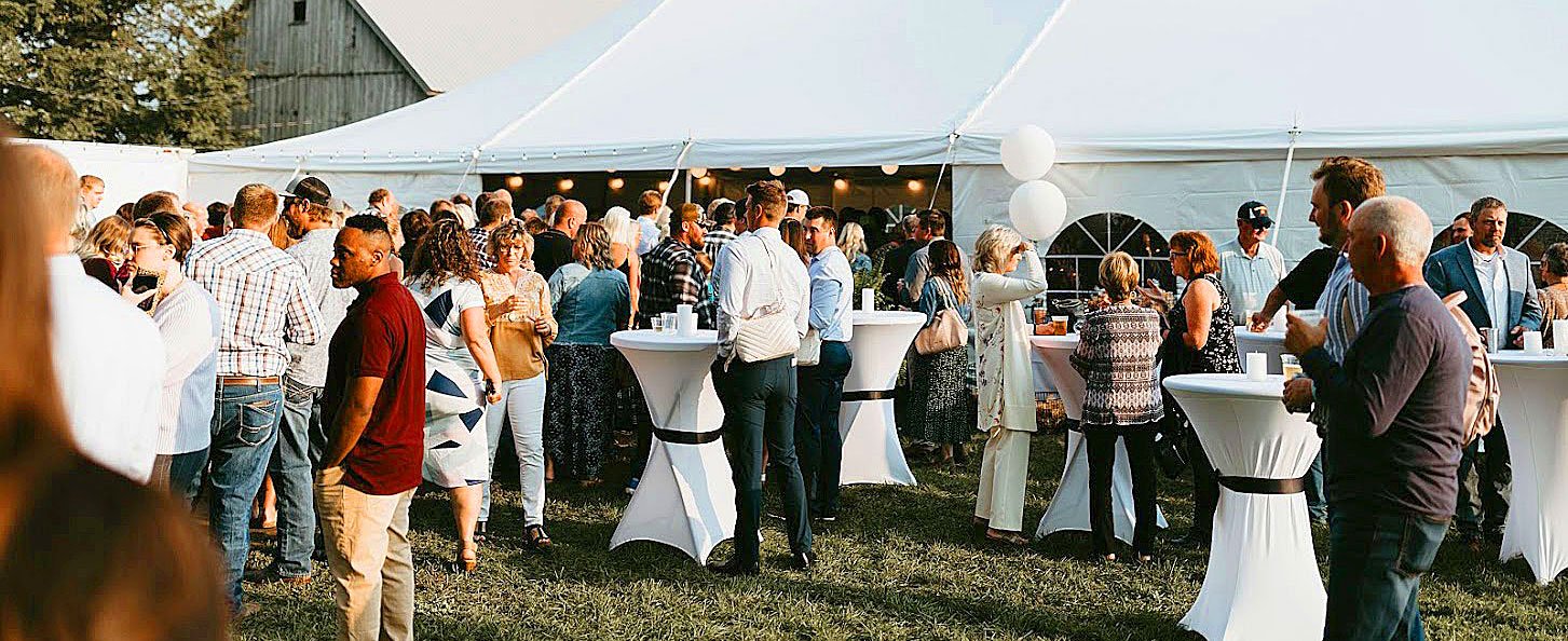 Crowd-of-people-outside-tent-at-reception.jpg