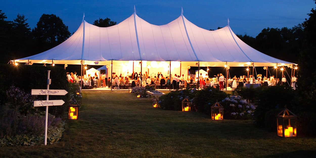  Outside tents provide plenty of options for decorating including lights, lanterns, and other decorum.  