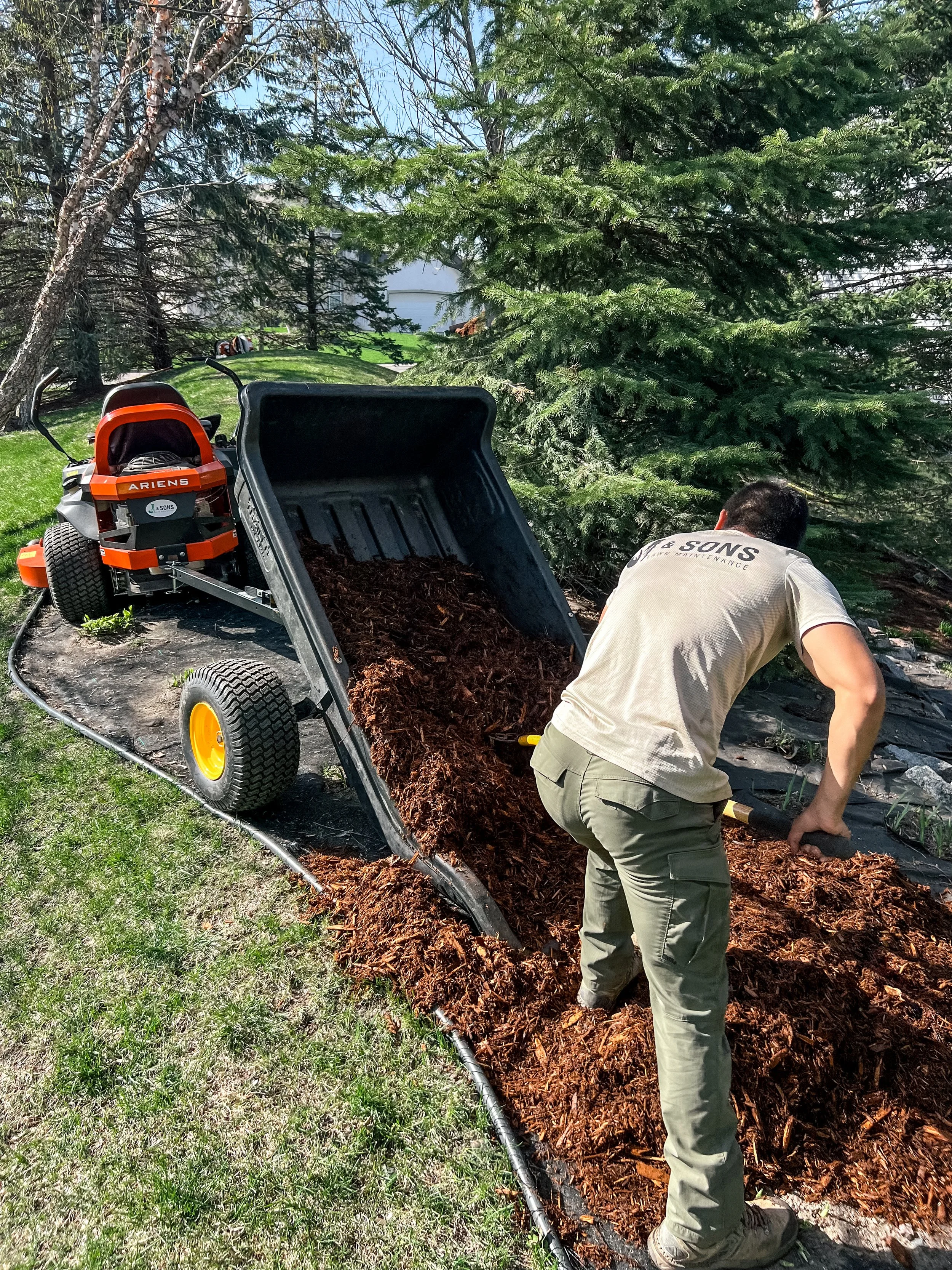 J_and_sons_Landscaping_and_hardscaping_mulch_installation-1.jpg