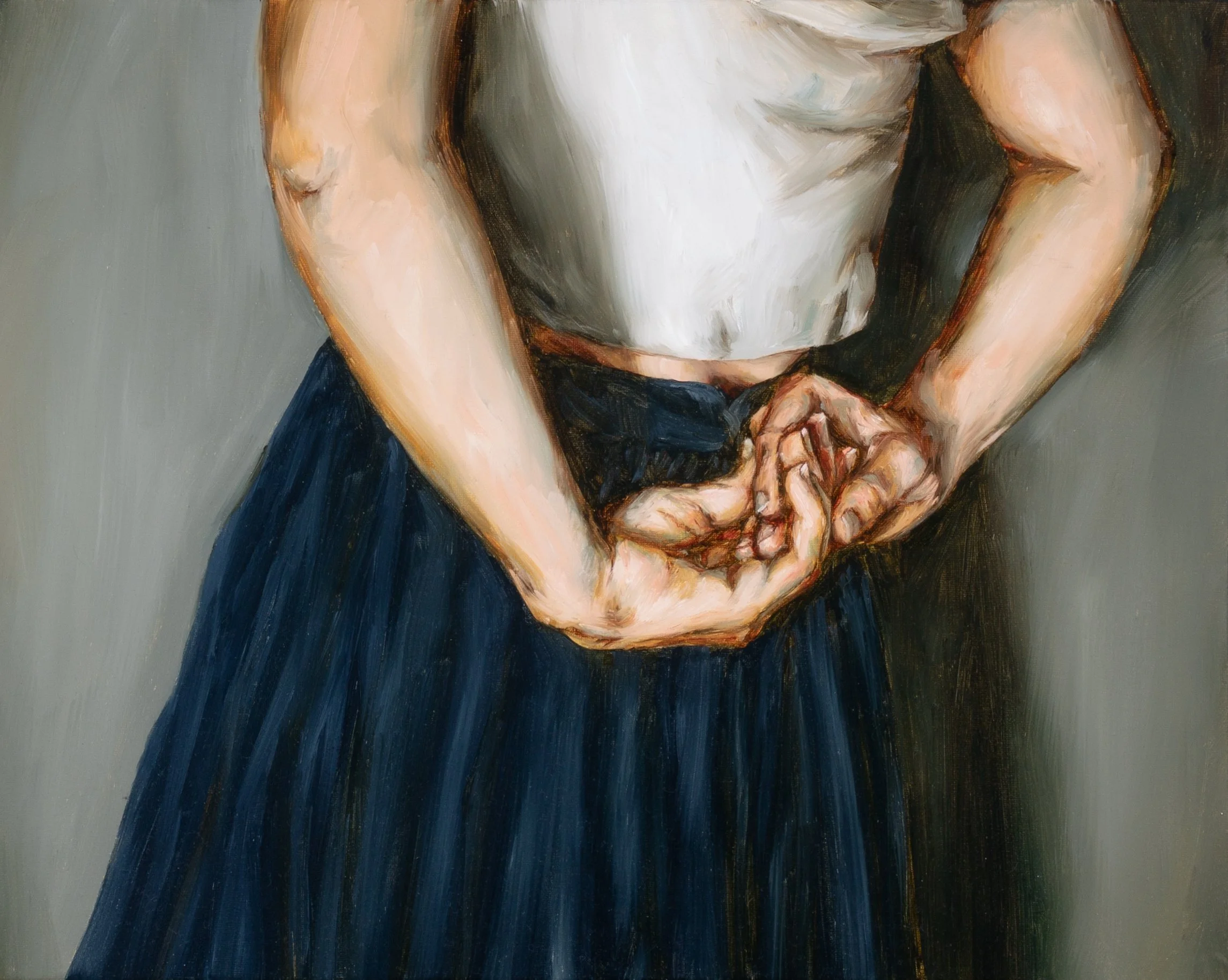 Original figurative oil painting of woman with hands behind her back wearing a navy skirt and white shirt titled Wrapt by Hampton Watts — Southern heritage painter, Savannah