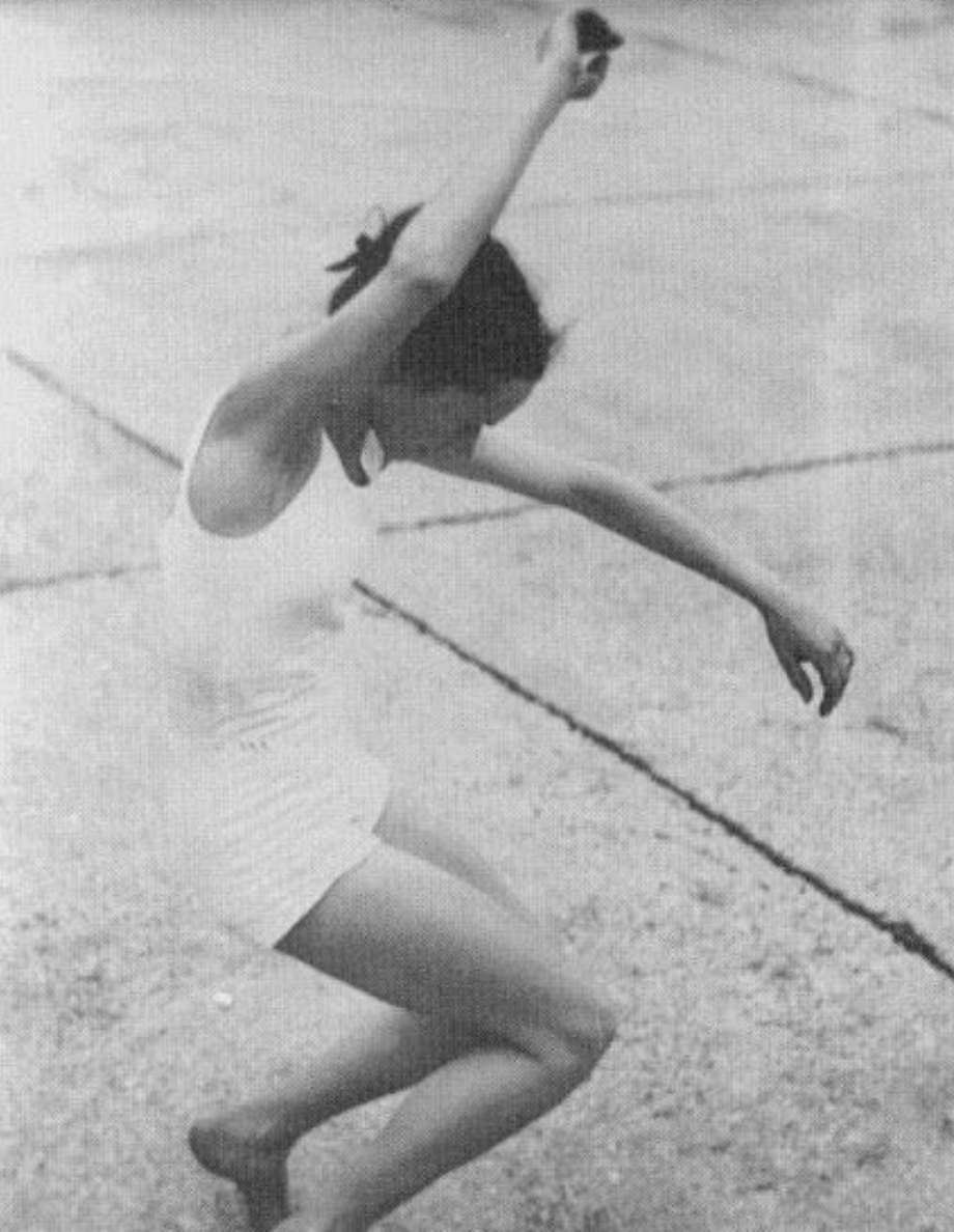 A black and white photo of an embodied woman reclaiming freedom of expression according to her Human Design.