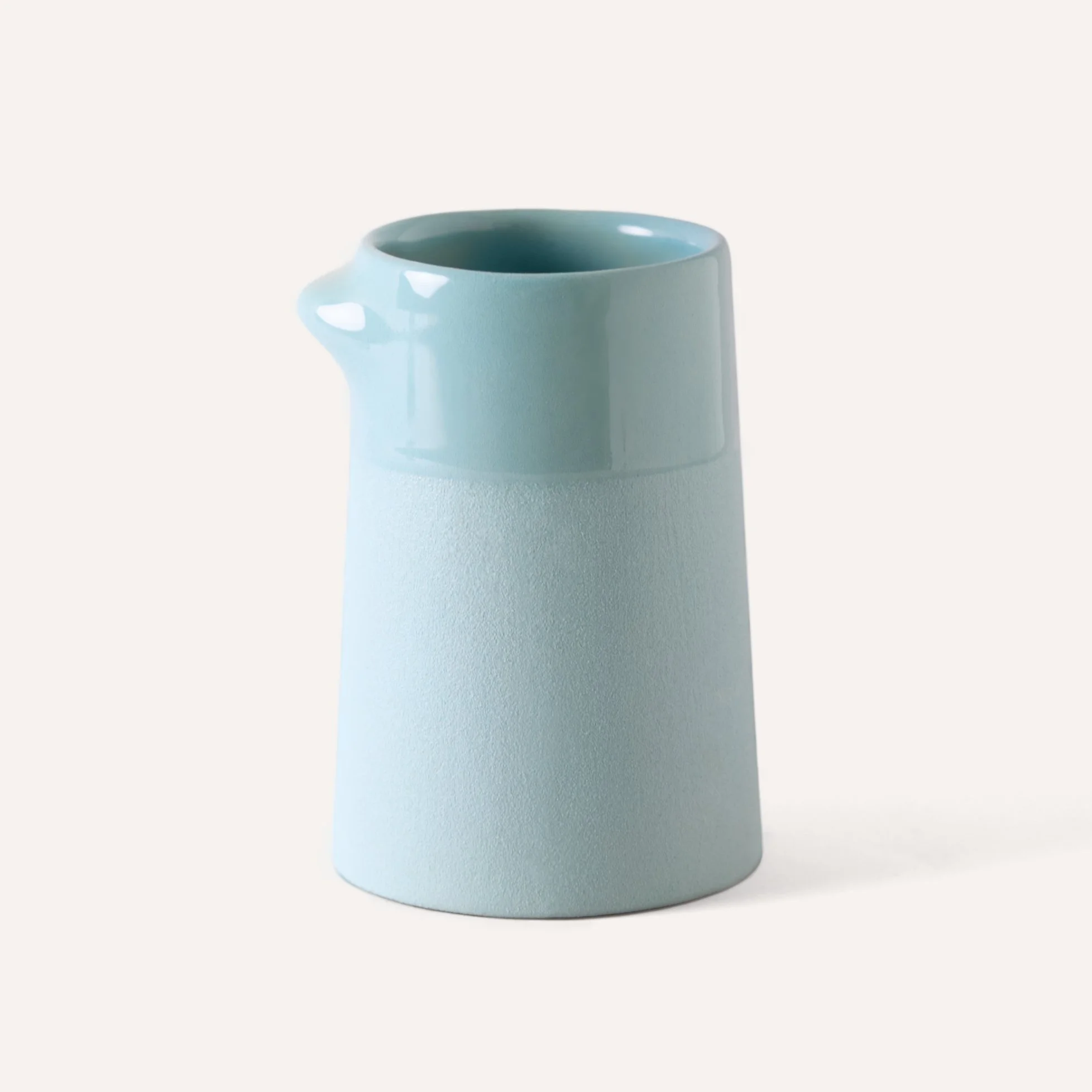 ceramic-coffee-cup-sculptural-handle-blue.jpg