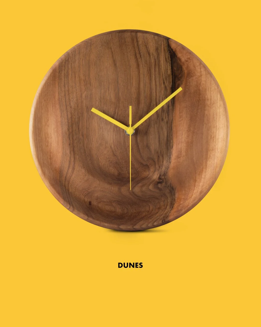 Drifting through time. &mdash; Dunes. #walnutwood #walnut #sculpturaldesign #sculptures #clock #yellow #industrialdesign #timepiece #timelessdesign #greekdesigners