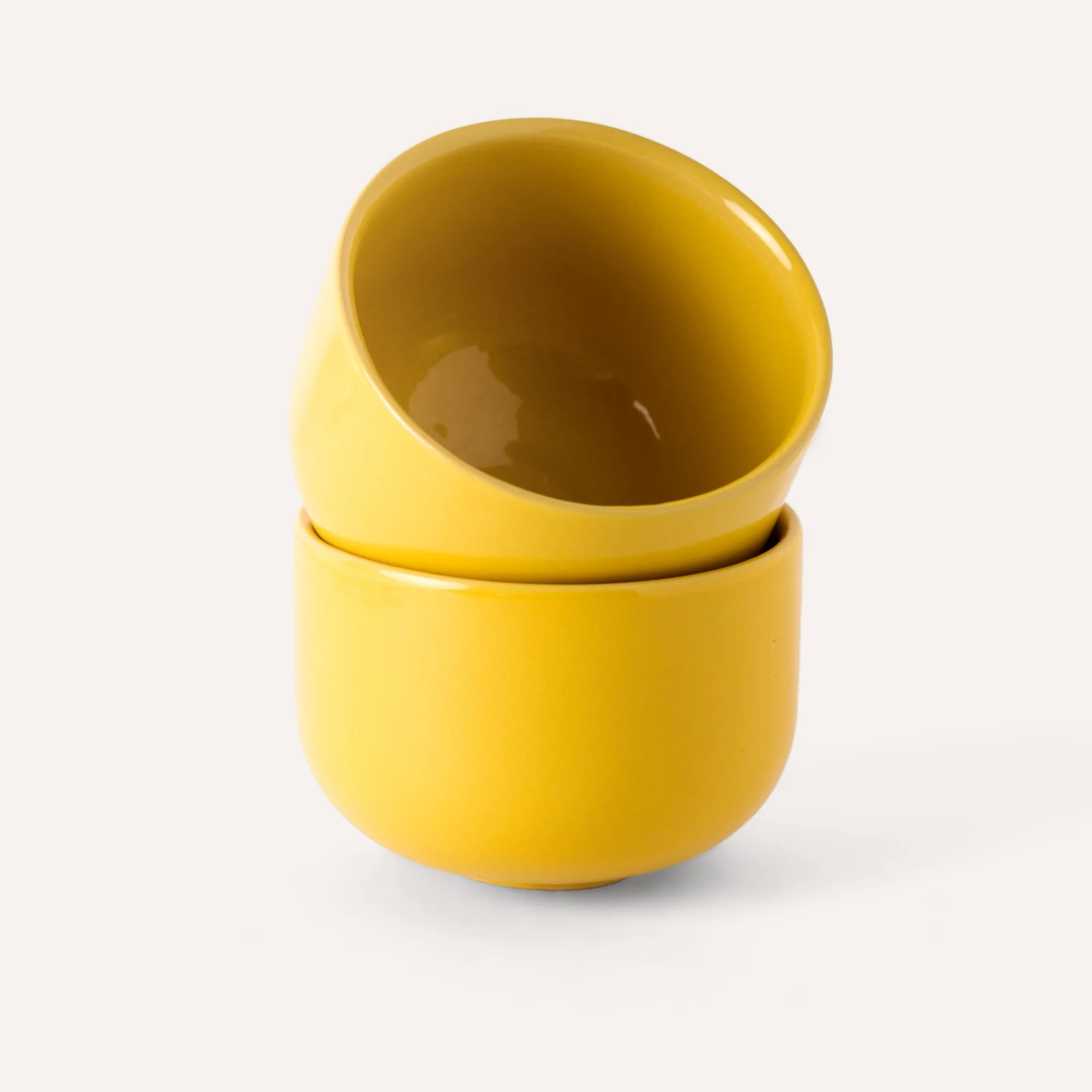 ceramic-tea-cups-glossy-yellow.jpg