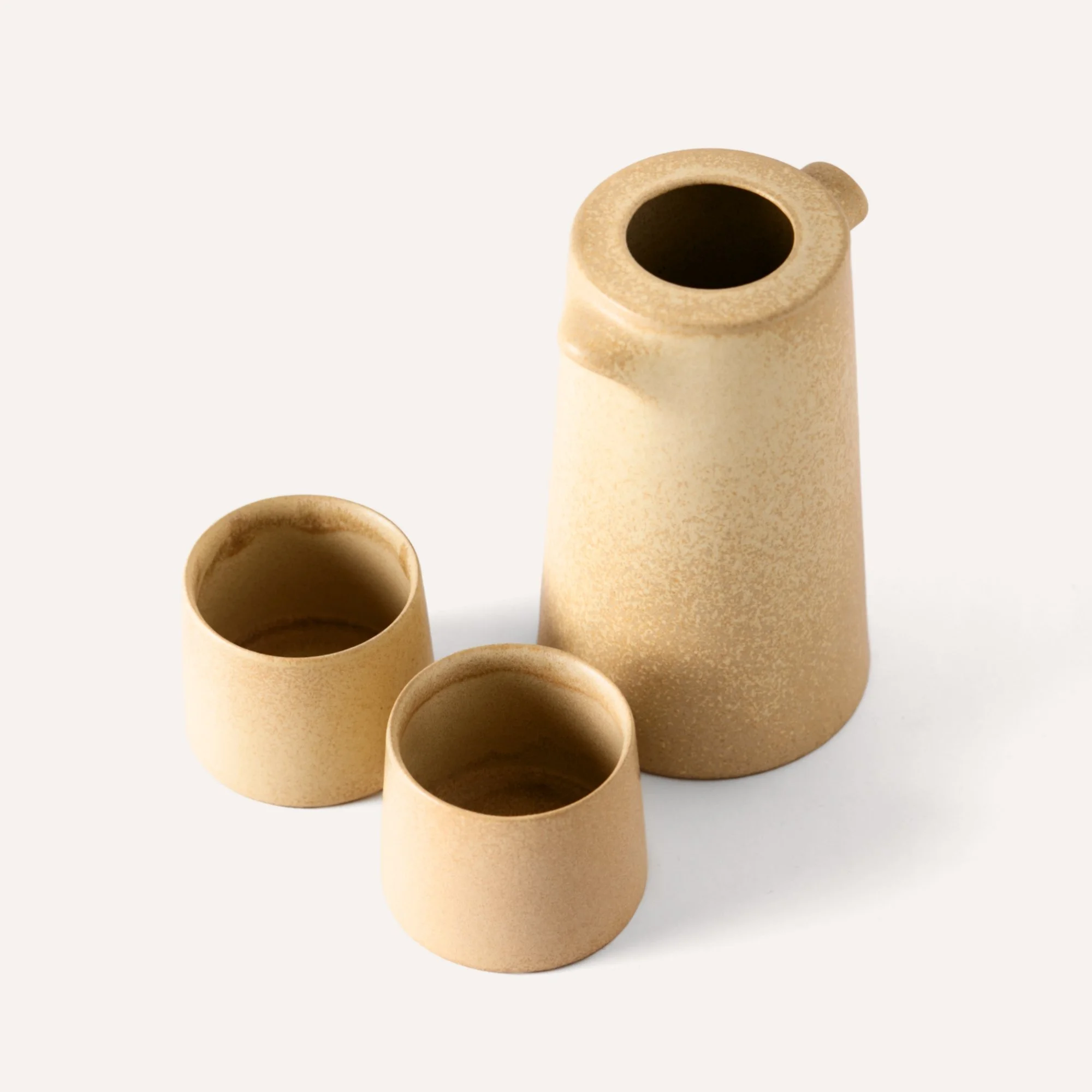 beige-stoneware-serving-jug-cups.jpg