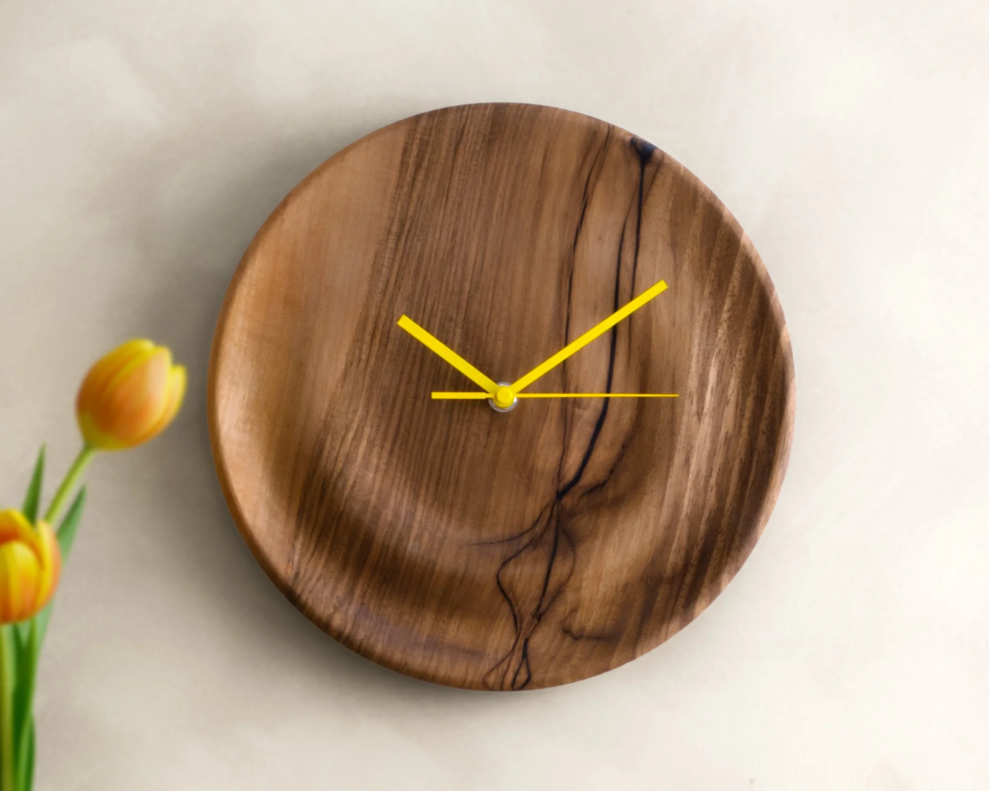 walnut-clock-on-wall-yellow-hands-minimal-interior.jpg