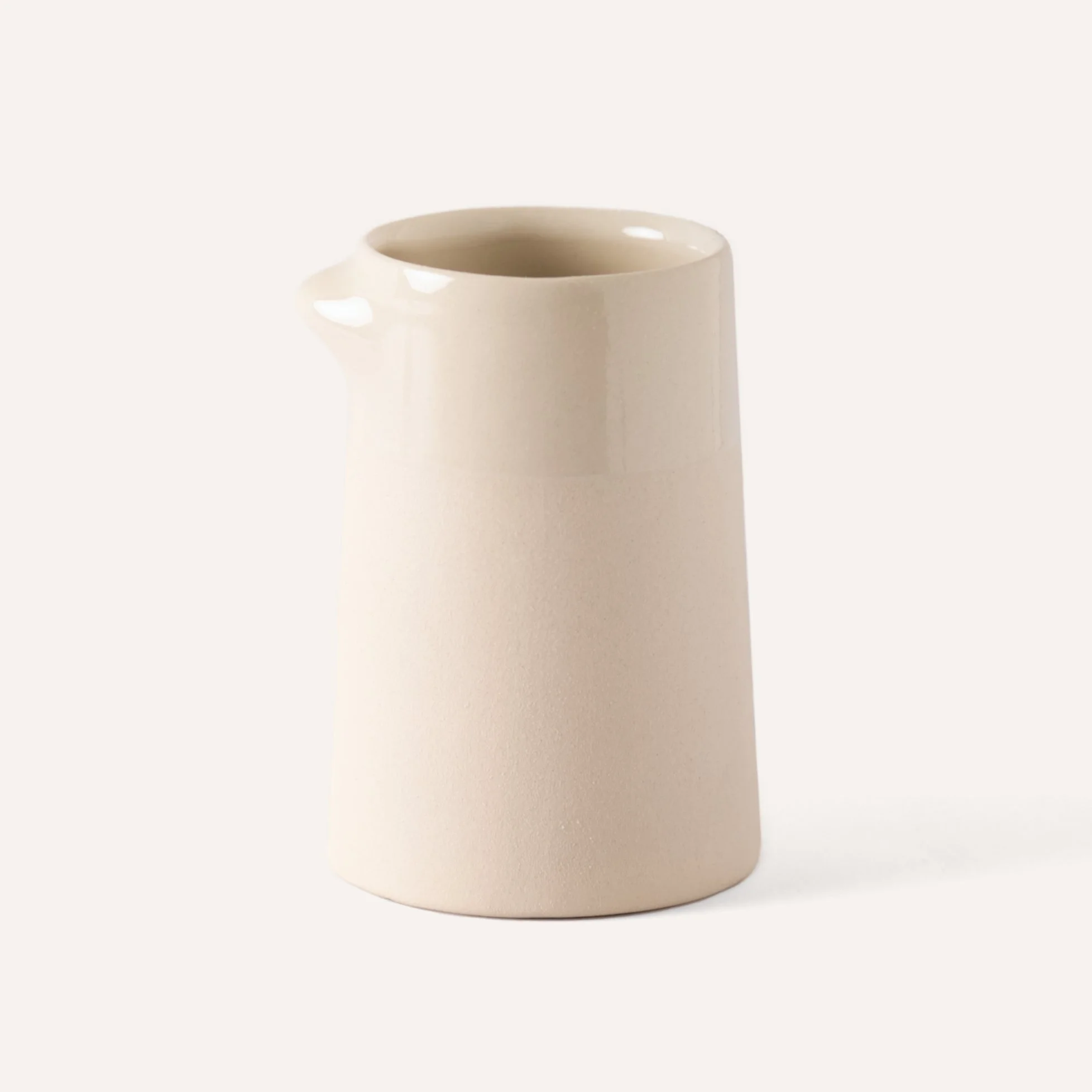 ceramic-coffee-cup-white-sculptural-handle.jpg