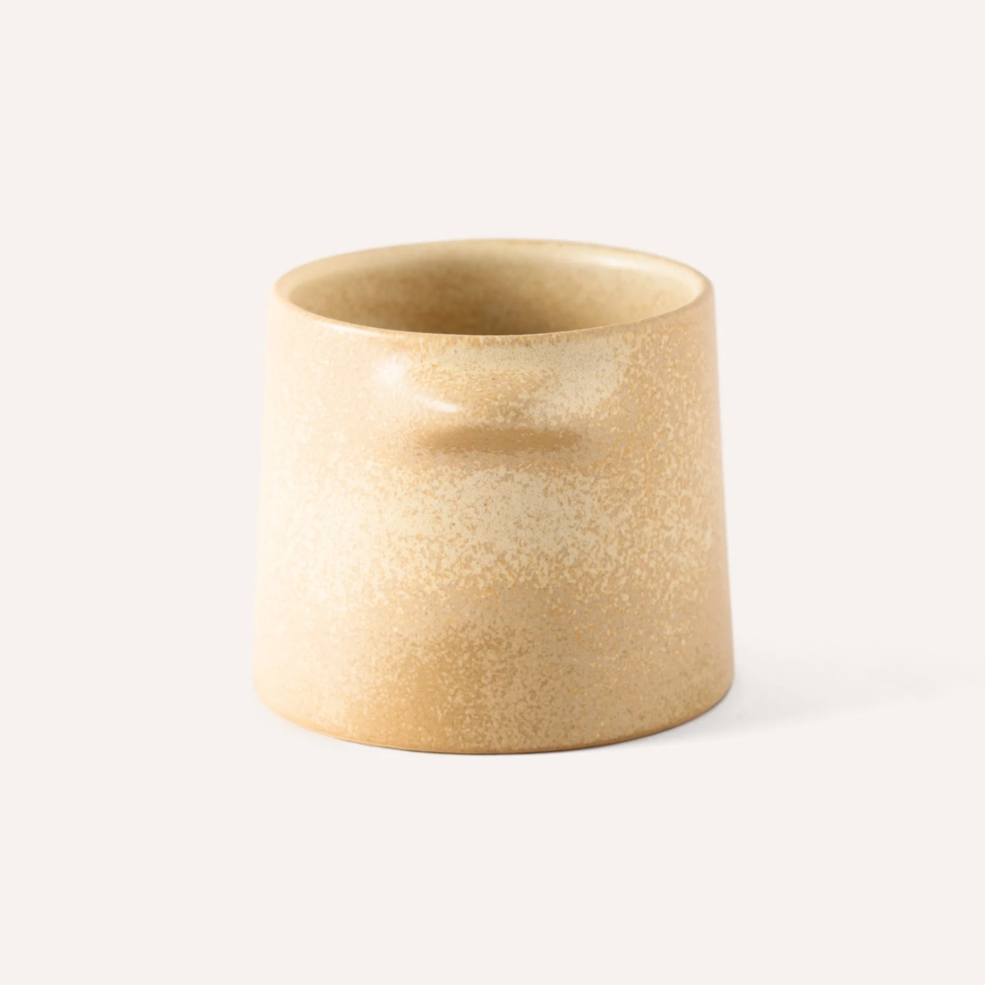 beige-handleless-stoneware-cup.jpg