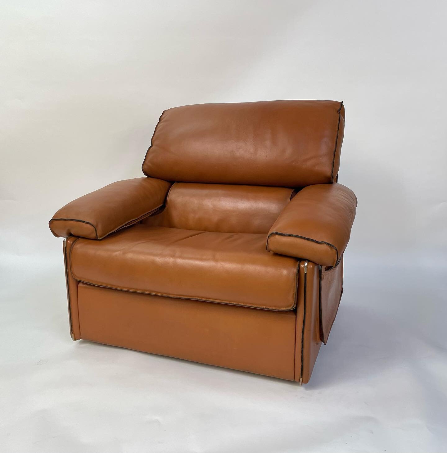 Here we a have a wonderful example of a late 70s lounge chair. Our team installed a three part combination of geese feathers, polyfill and shredded foam in all of the cushion compartments. We also restored the color on 70% of the piece and touched up