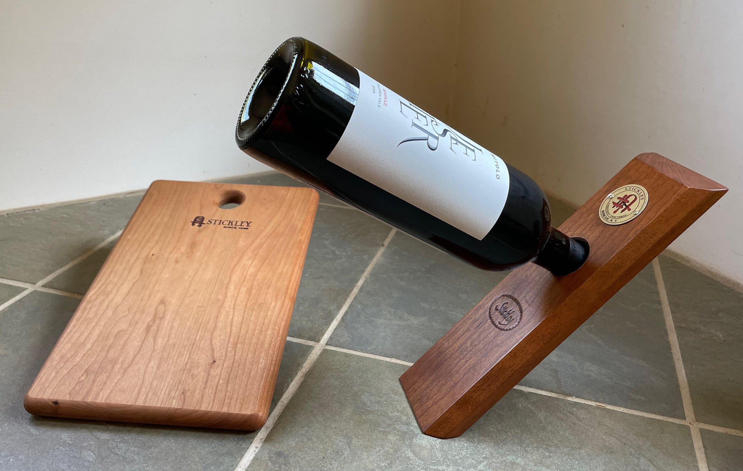 Stickley cutting board (11" x 7 1/2") and wine bottle holder