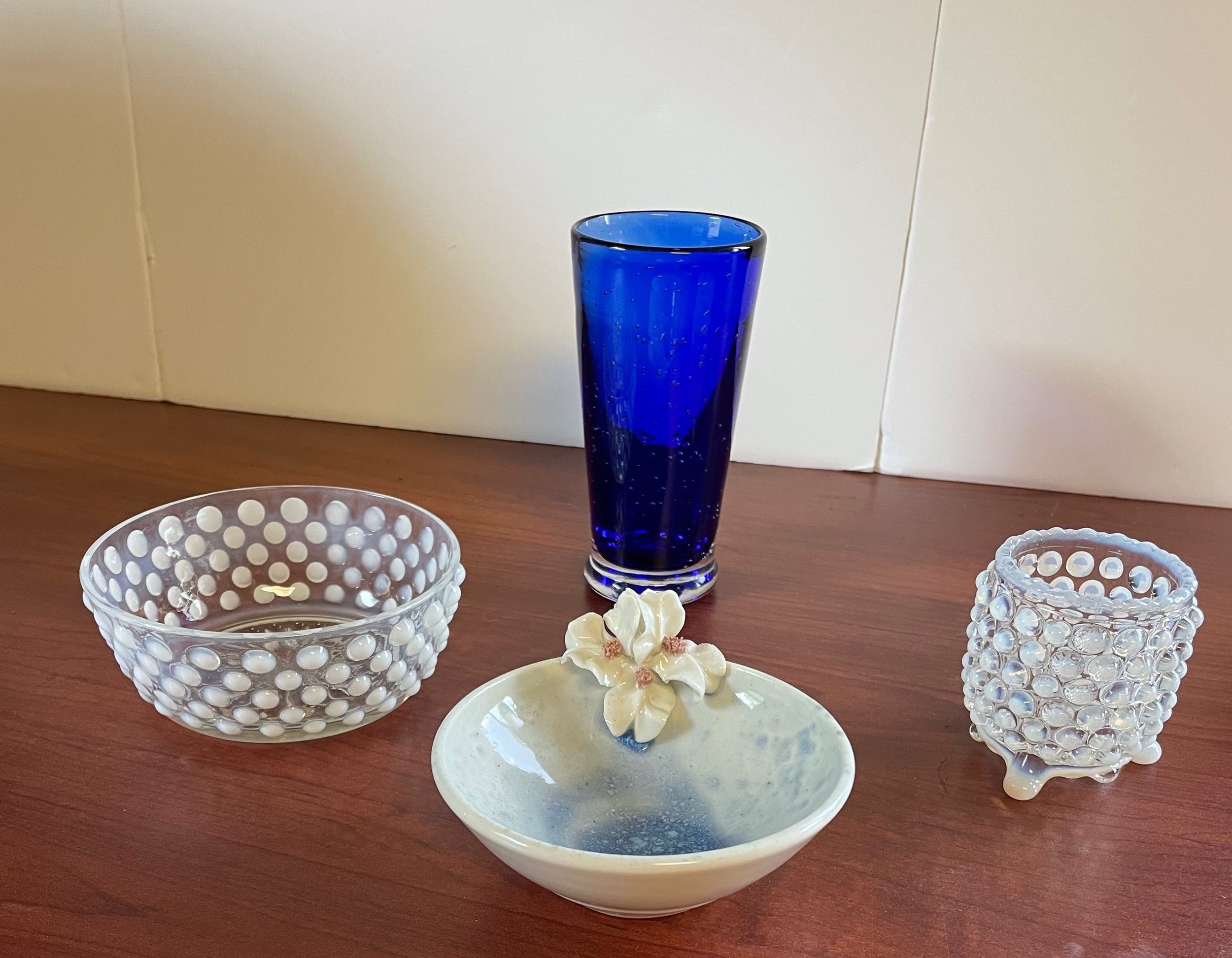 Blue and White Glass Set. Iris pottery bowl (4") by Dee Ann VonHunke, vintage hobnail bowl (4 1/2") and bud vase/toothpick holder (2 1/2"), and cobalt blue glass vase (5")