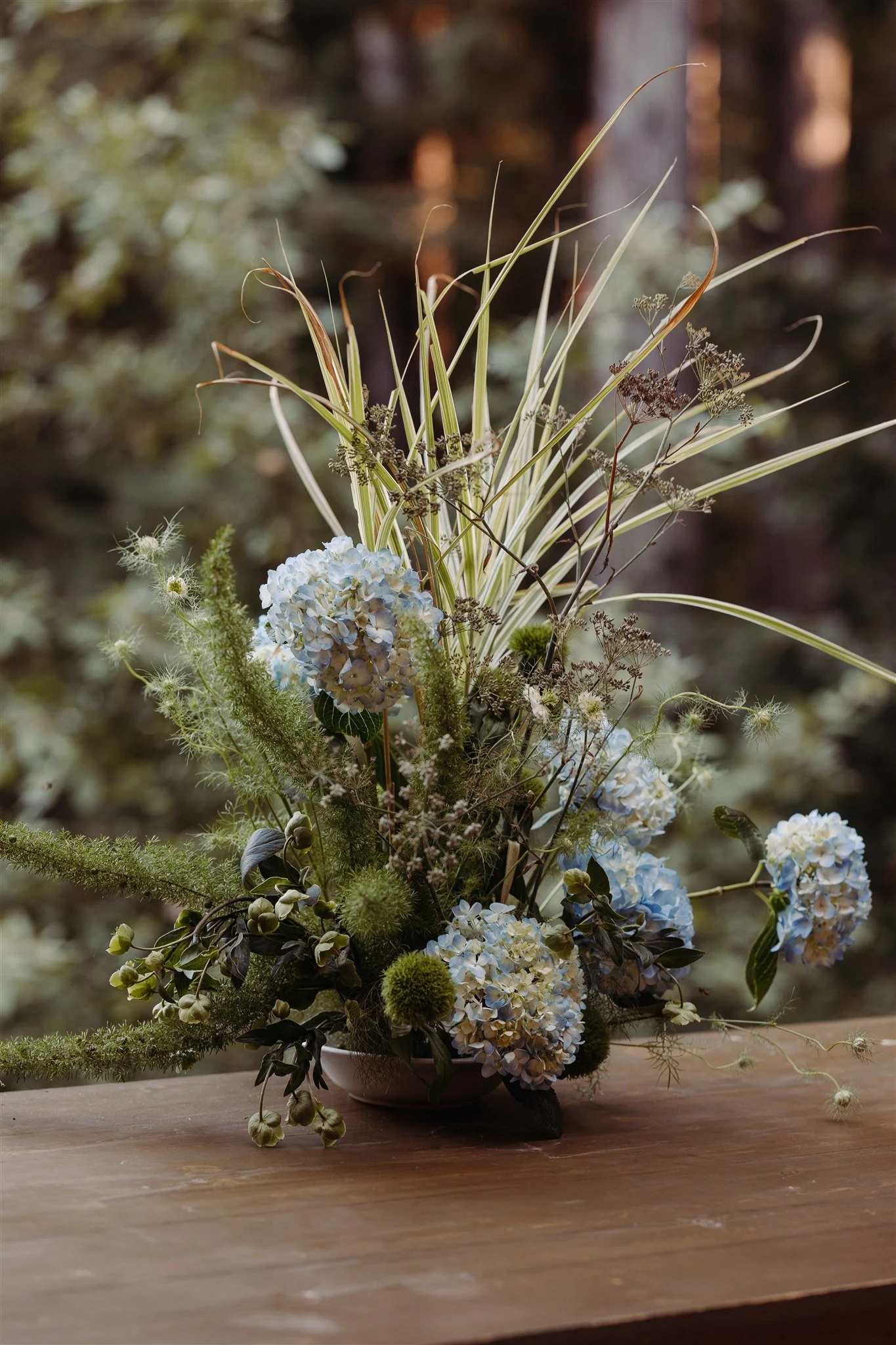 unique bar arrangement for wedding with grasses