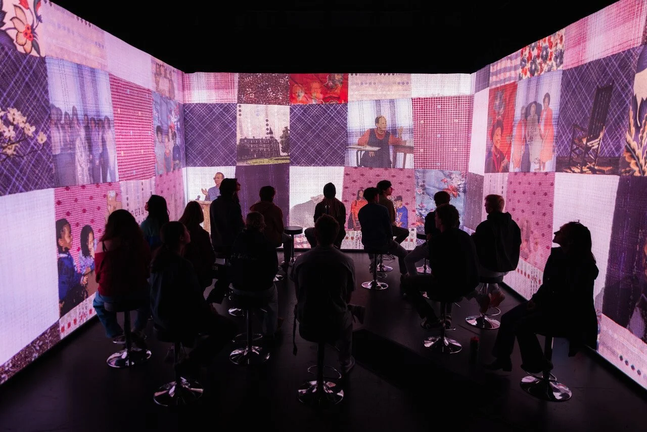 A class visiting the Nikki Giovanni memorial immersive experience. Photo by Luke Hayes for Virginia Tech.