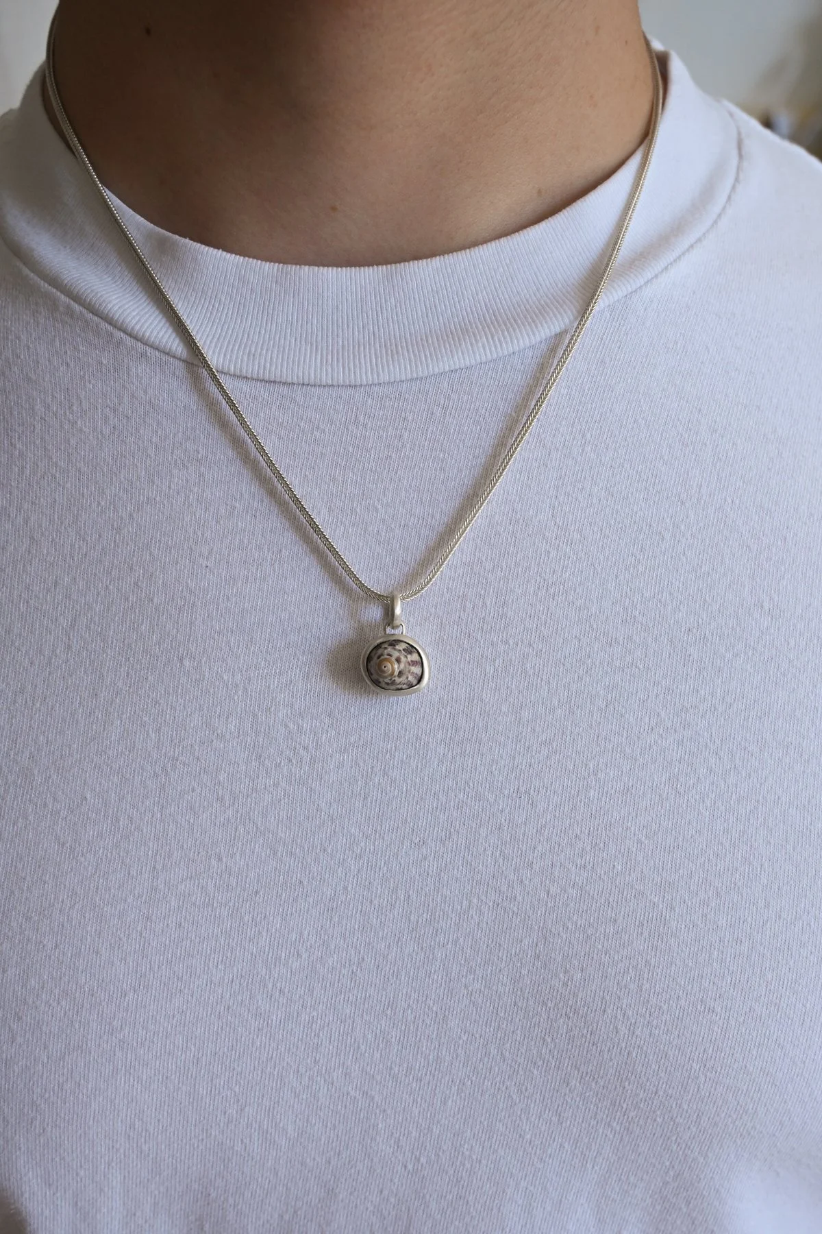 Dunton-Ellerkamp-Pendant-On-Figure-1.jpg