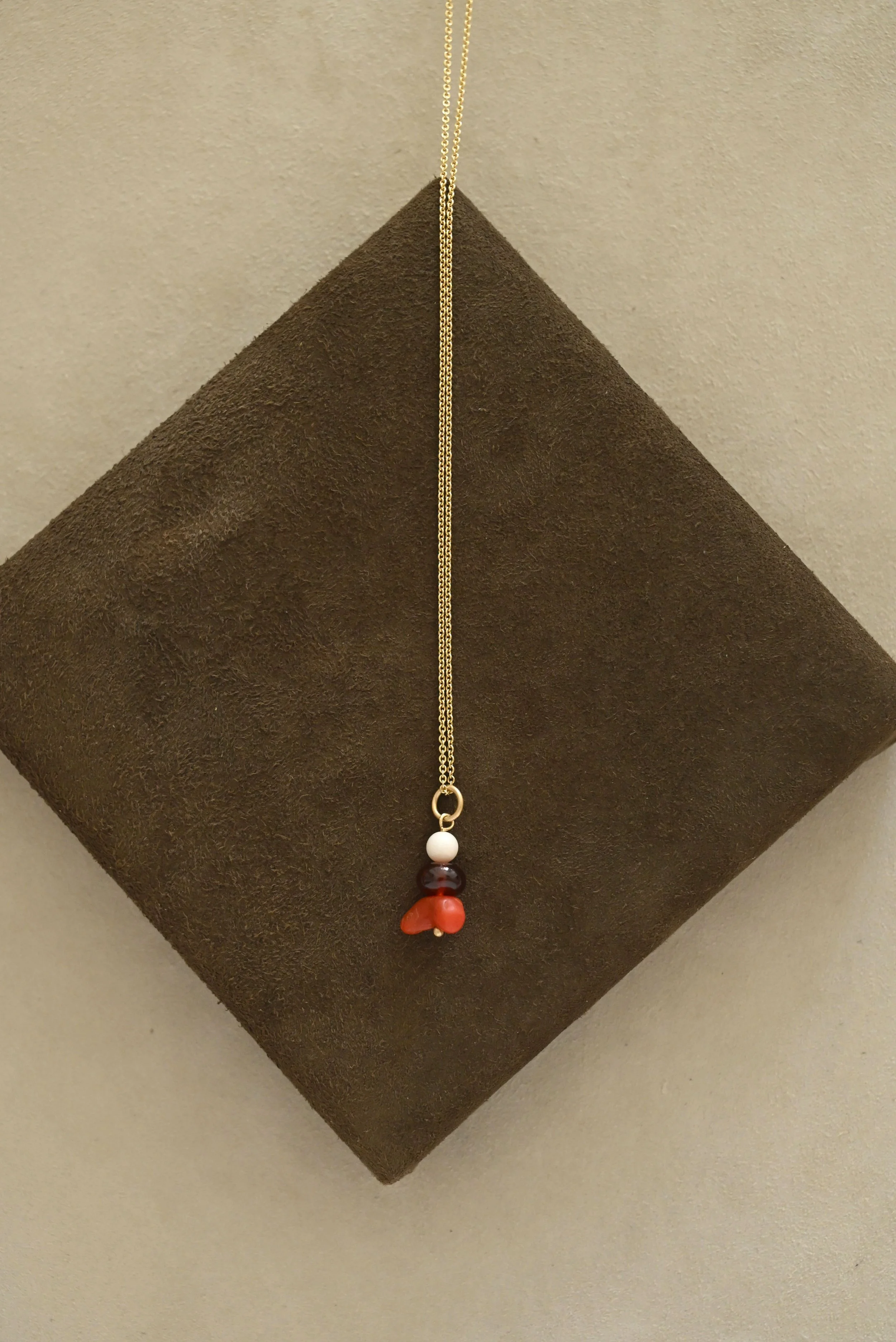 Dunton-Ellerkamp-Fall-Capsule-Collection-2026-Hessonite-Garnet-Coral-Talismans-2.jpg