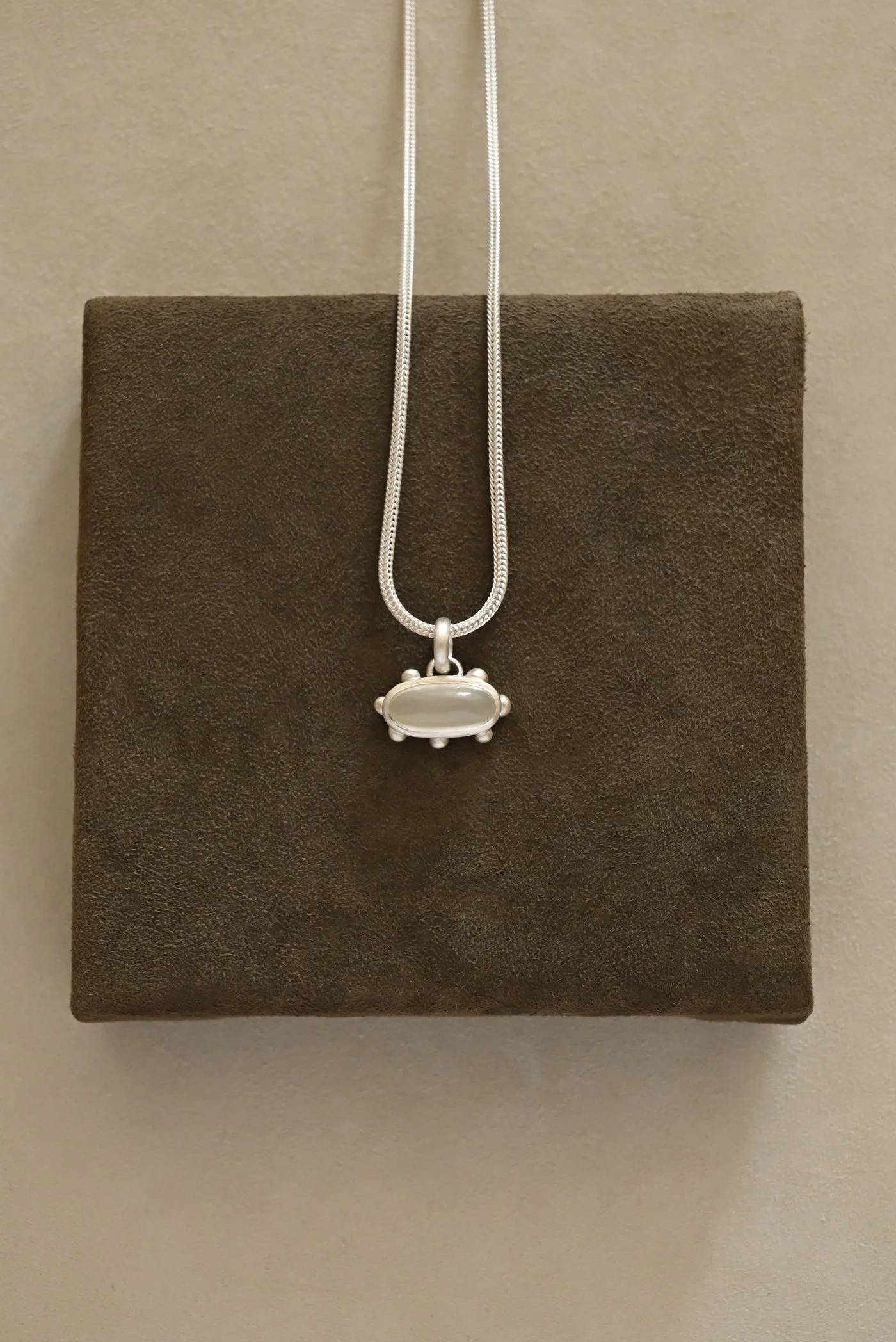 Moonstone Pendant with Six Dots