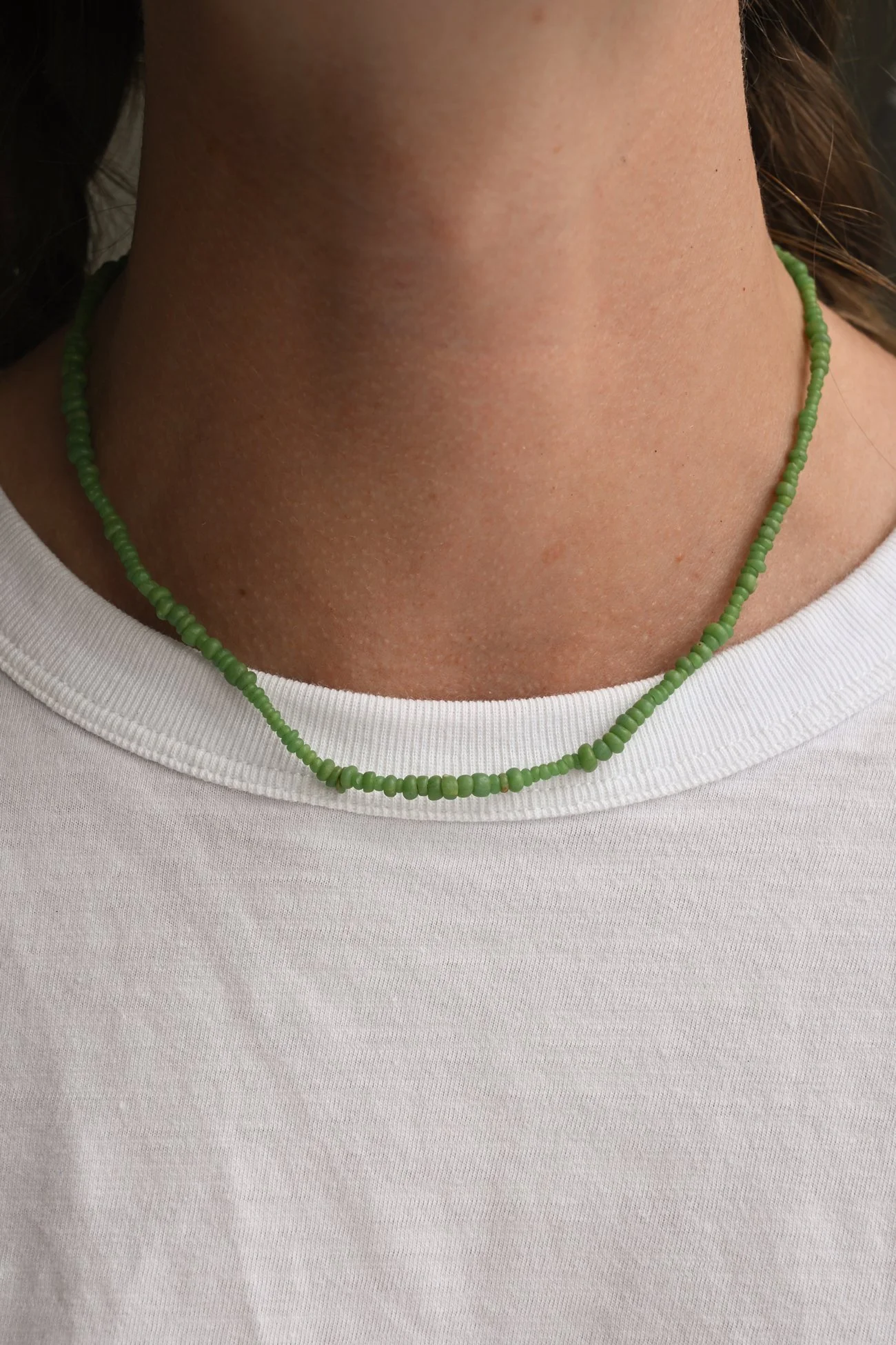 Dunton-Ellerkamp-Indonesian-Green-Glass-On-Figure-1.jpg