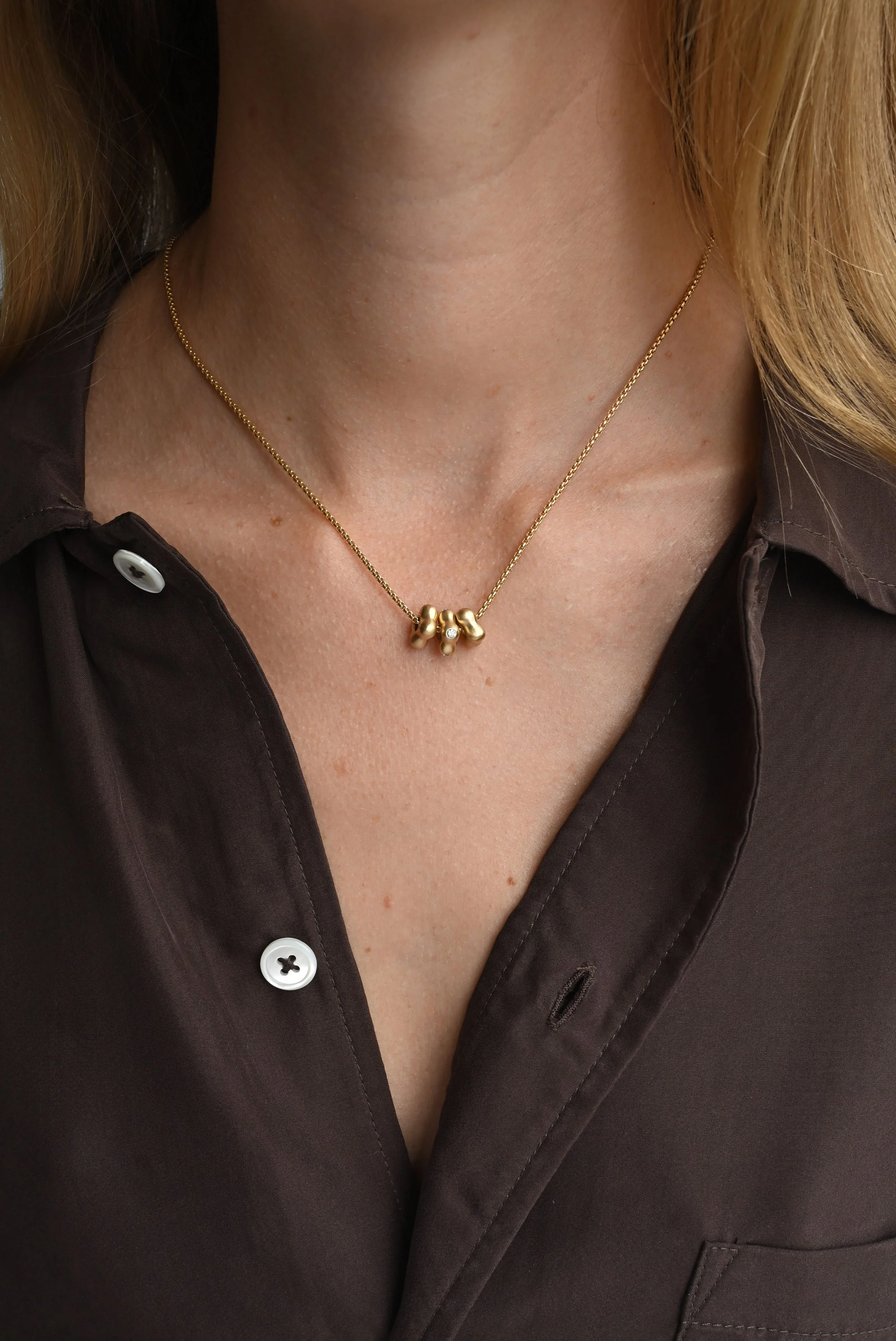Dunton-Ellerkamp-Fall-Capsule-Collection-2026-Gold-Owen-Spinner-Necklace-1.jpg (Copy)