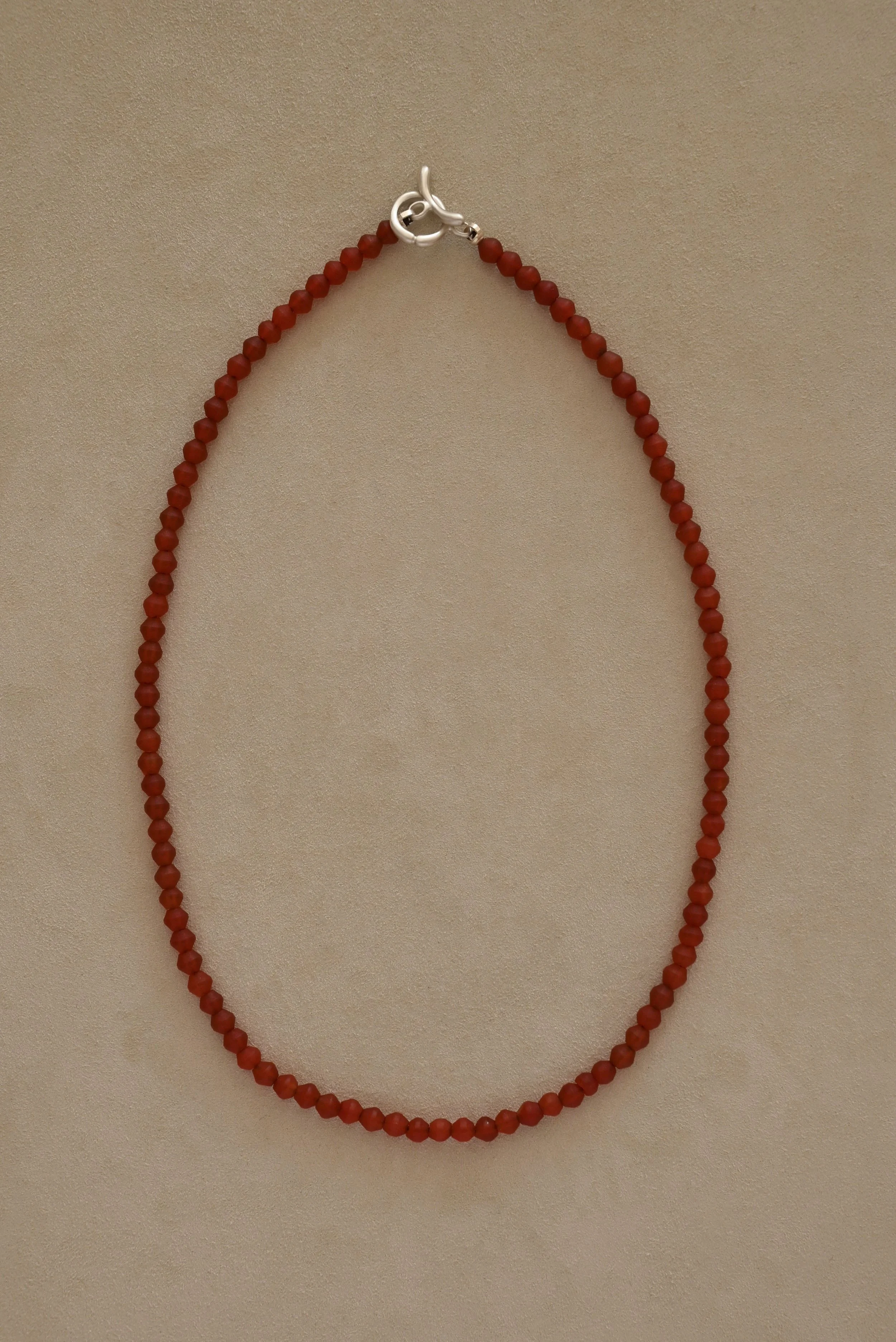Dunton-Ellerkamp-Fall-Capsule-2026-Web-Apple-Red-Carnelian-Strand-1.jpg