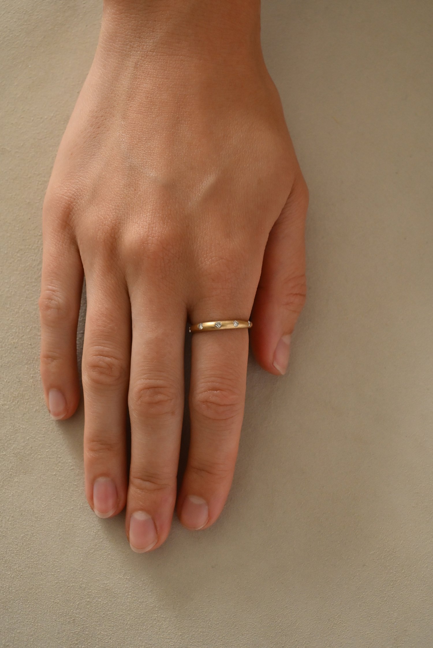 Dunton-Ellerkamp-Crescent-Ring-Thin-Diamond-Scattered.jpg