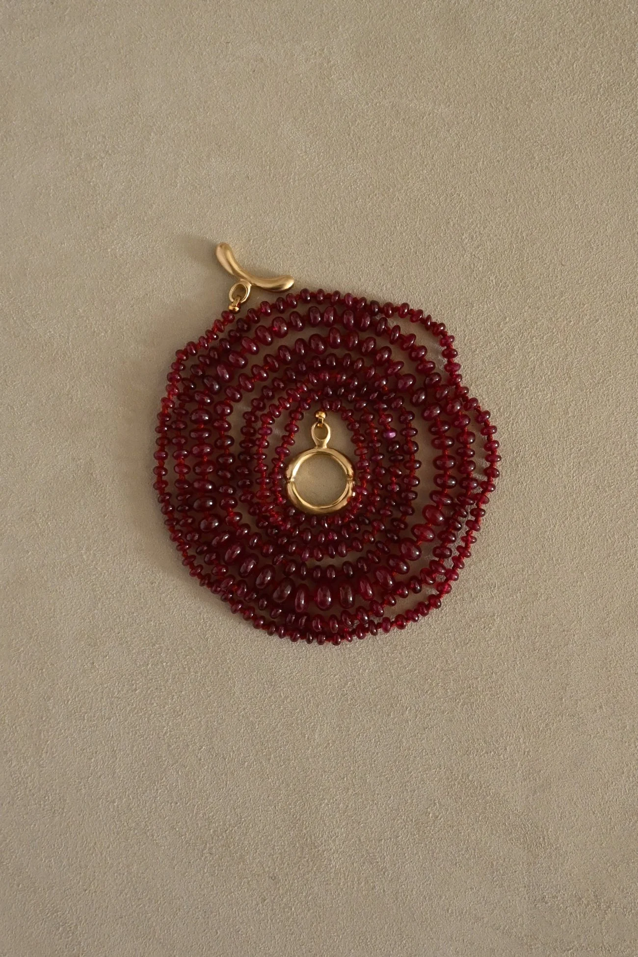 Dunton-ellerkamp-graduated-ruby-strand-long-1.jpg